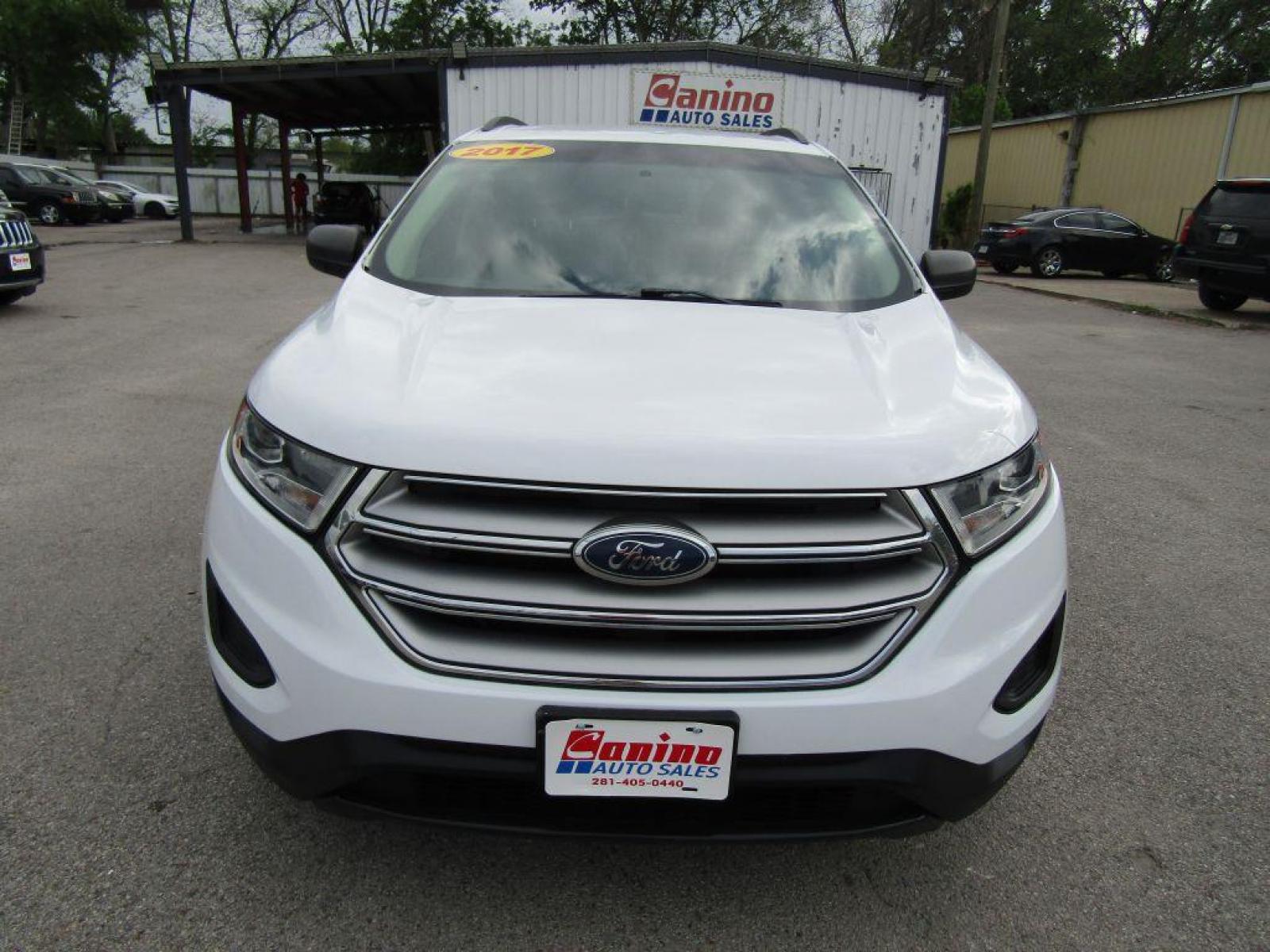 2017 WHITE FORD EDGE SE (2FMPK3G97HB) with an 2.0L engine, Automatic transmission, located at 830 E. Canino Rd., Houston, TX, 77037, (281) 405-0440, 38.358219, -81.729942 - Photo #0