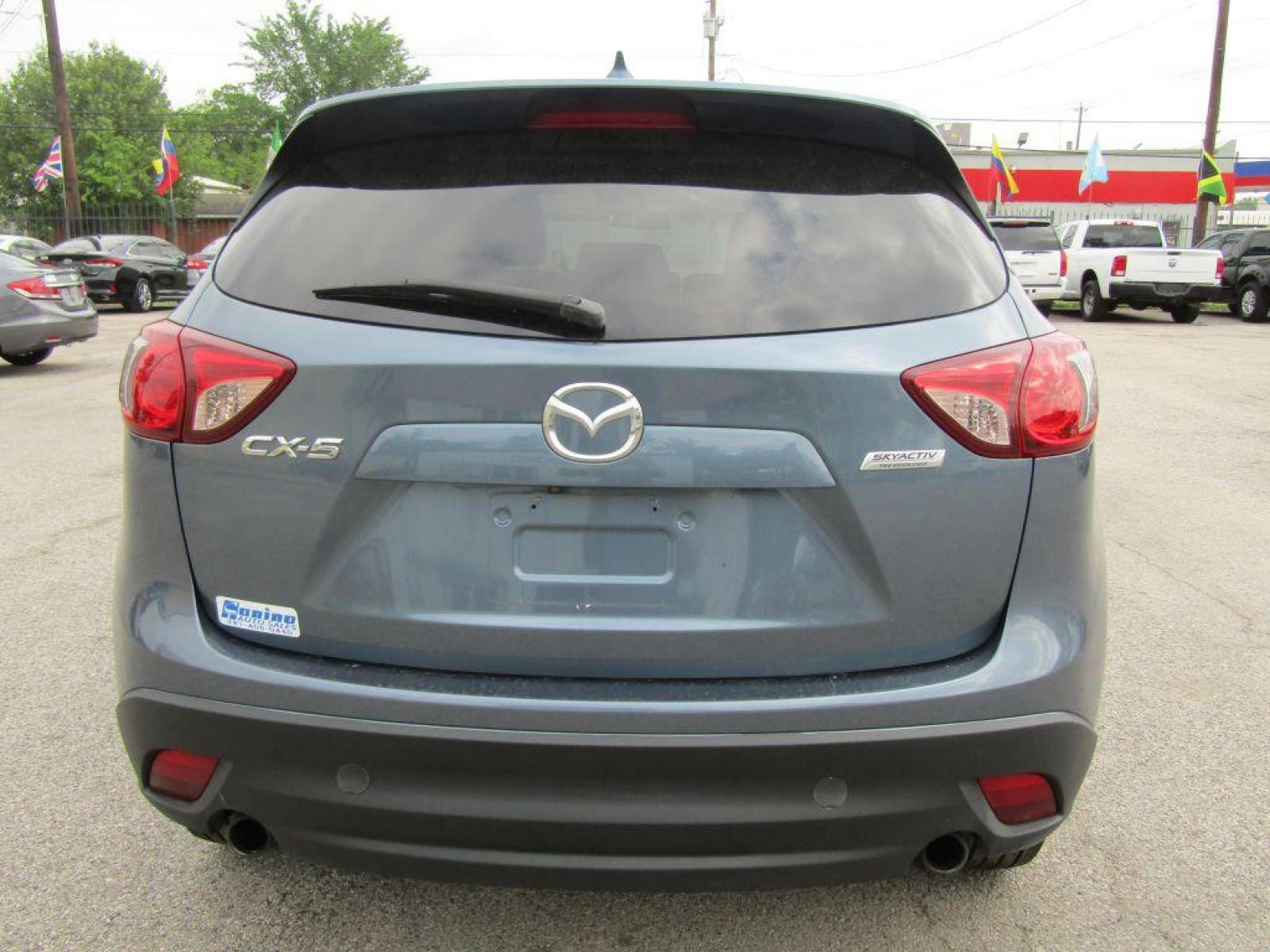 2016 BLUE MAZDA CX-5 TOURING (JM3KE2CY9G0) with an 2.5L engine, Automatic transmission, located at 830 E. Canino Rd., Houston, TX, 77037, (281) 405-0440, 38.358219, -81.729942 - Photo #3