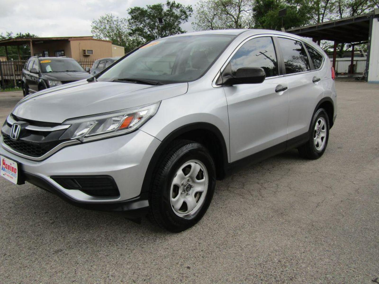 2016 SILVER HONDA CR-V LX (3CZRM3H38GG) with an 2.4L engine, Continuously Variable transmission, located at 830 E. Canino Rd., Houston, TX, 77037, (281) 405-0440, 38.358219, -81.729942 - Photo #1