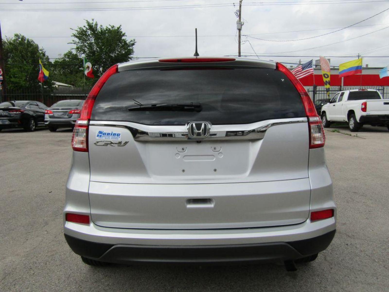 2016 SILVER HONDA CR-V LX (3CZRM3H38GG) with an 2.4L engine, Continuously Variable transmission, located at 830 E. Canino Rd., Houston, TX, 77037, (281) 405-0440, 38.358219, -81.729942 - Photo #3
