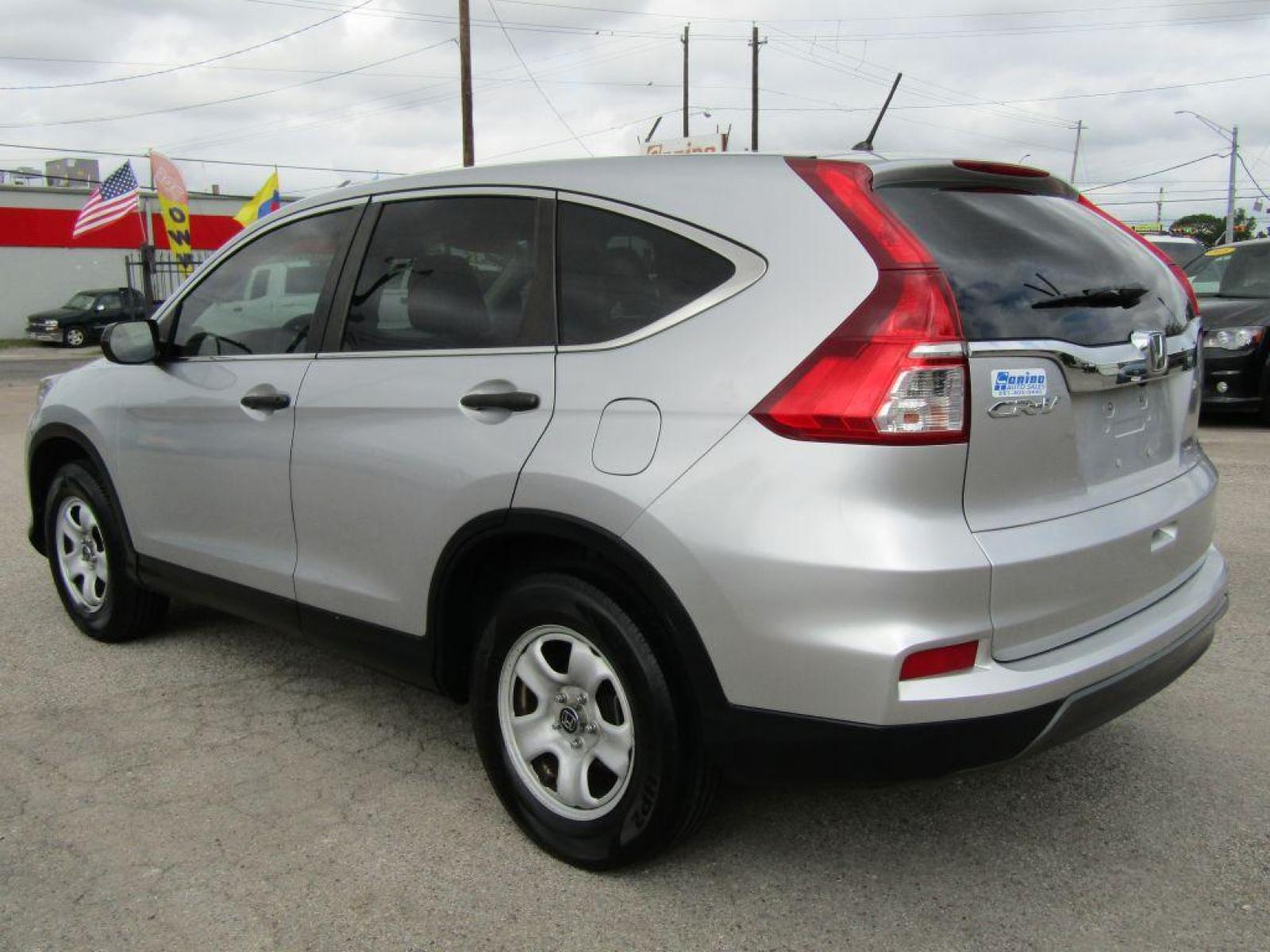 2016 SILVER HONDA CR-V LX (3CZRM3H38GG) with an 2.4L engine, Continuously Variable transmission, located at 830 E. Canino Rd., Houston, TX, 77037, (281) 405-0440, 38.358219, -81.729942 - Photo #5