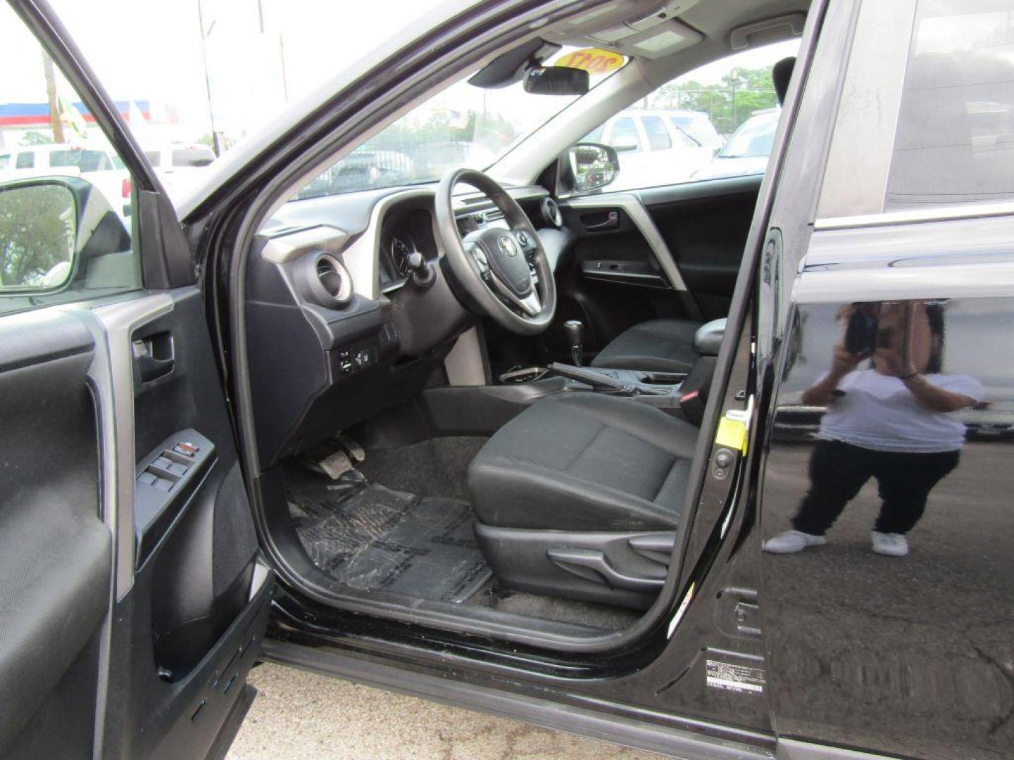 2017 BLACK TOYOTA RAV4 LE (2T3ZFREV5HW) with an 2.5L engine, Automatic transmission, located at 830 E. Canino Rd., Houston, TX, 77037, (281) 405-0440, 38.358219, -81.729942 - Photo#6