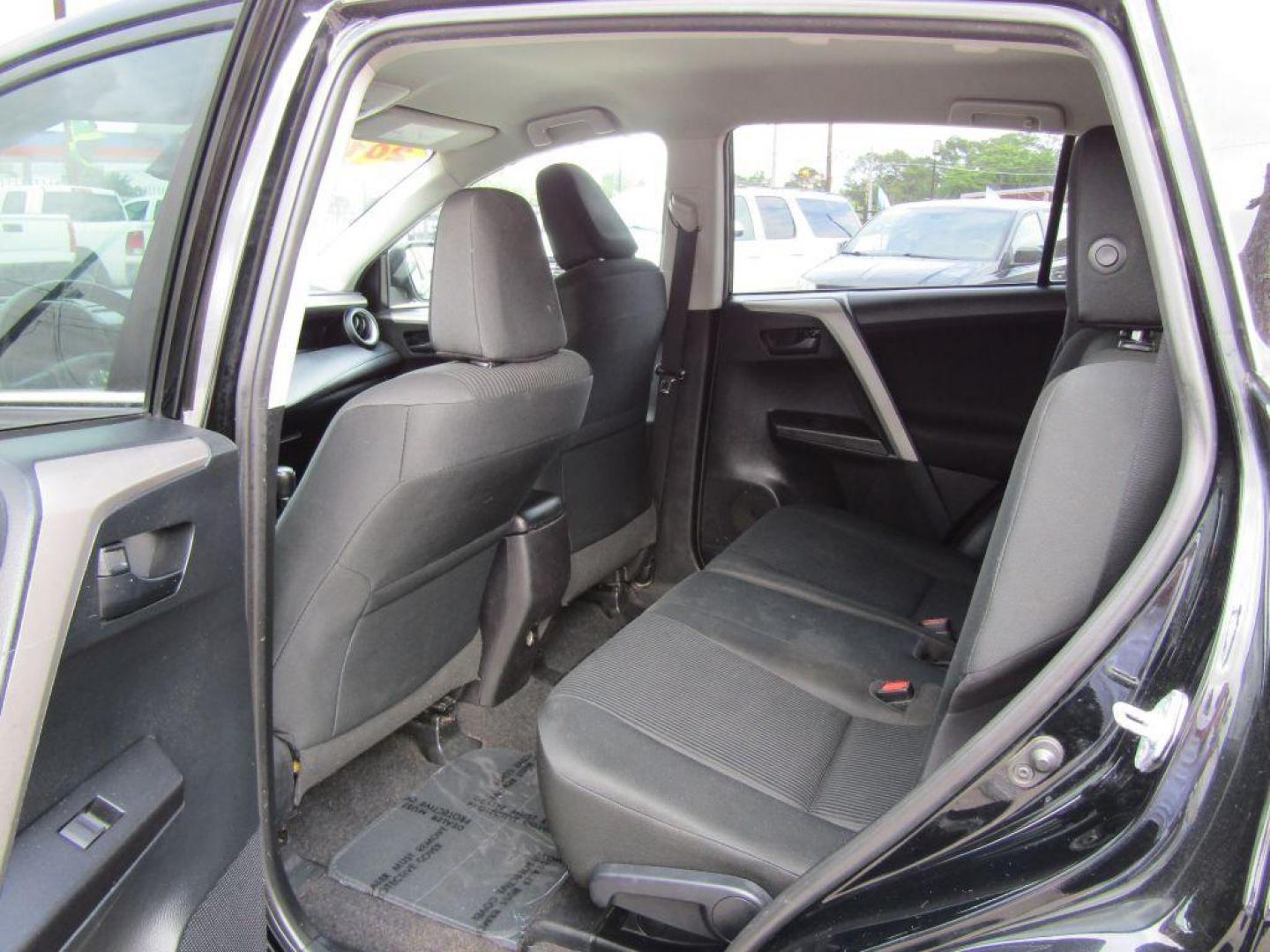 2017 BLACK TOYOTA RAV4 LE (2T3ZFREV5HW) with an 2.5L engine, Automatic transmission, located at 830 E. Canino Rd., Houston, TX, 77037, (281) 405-0440, 38.358219, -81.729942 - Photo#8