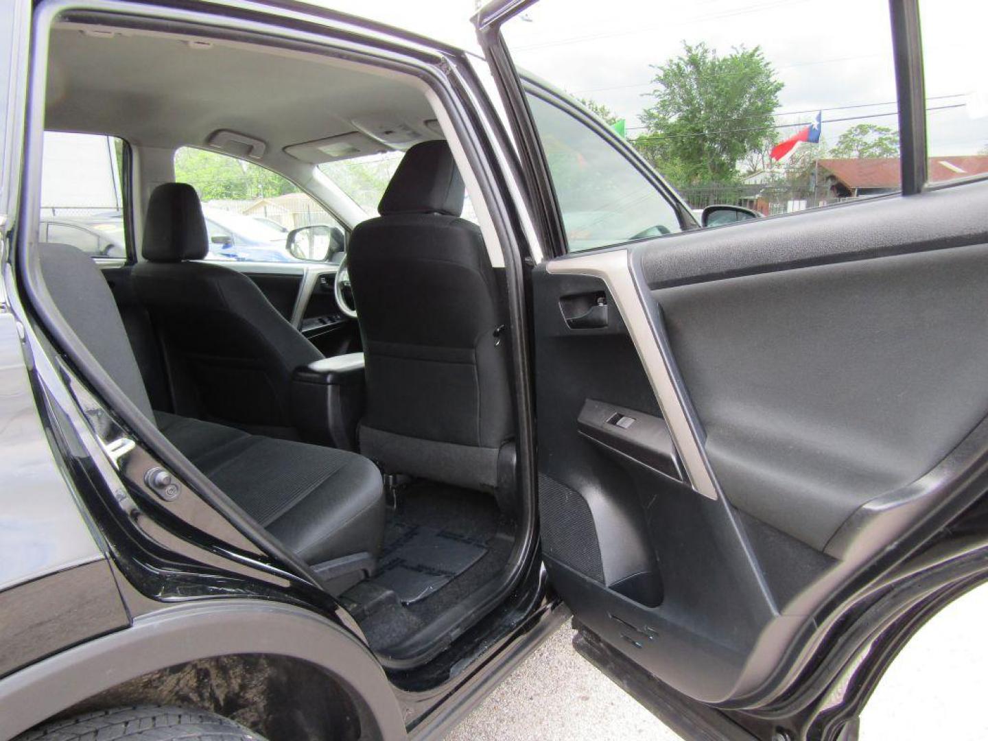 2017 BLACK TOYOTA RAV4 LE (2T3ZFREV5HW) with an 2.5L engine, Automatic transmission, located at 830 E. Canino Rd., Houston, TX, 77037, (281) 405-0440, 38.358219, -81.729942 - Photo#16
