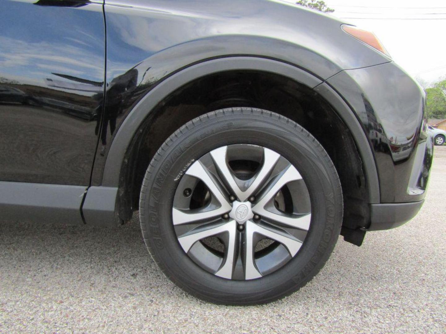 2017 BLACK TOYOTA RAV4 LE (2T3ZFREV5HW) with an 2.5L engine, Automatic transmission, located at 830 E. Canino Rd., Houston, TX, 77037, (281) 405-0440, 38.358219, -81.729942 - Photo#18