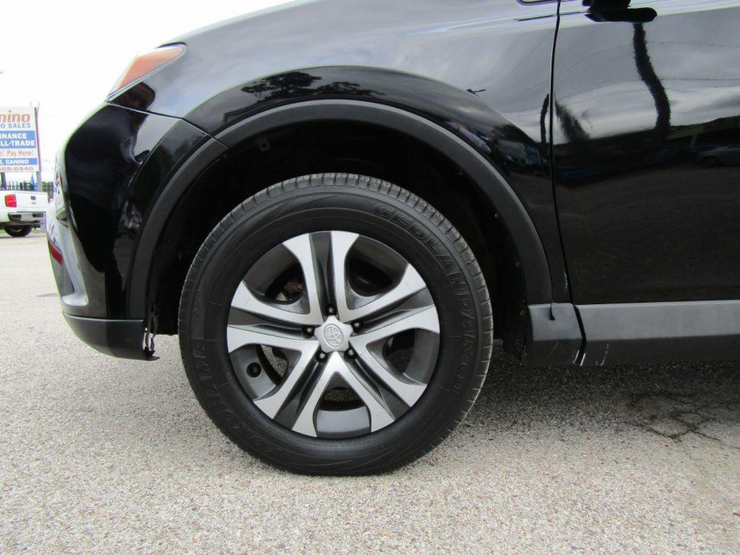 2017 BLACK TOYOTA RAV4 LE (2T3ZFREV5HW) with an 2.5L engine, Automatic transmission, located at 830 E. Canino Rd., Houston, TX, 77037, (281) 405-0440, 38.358219, -81.729942 - Photo#21