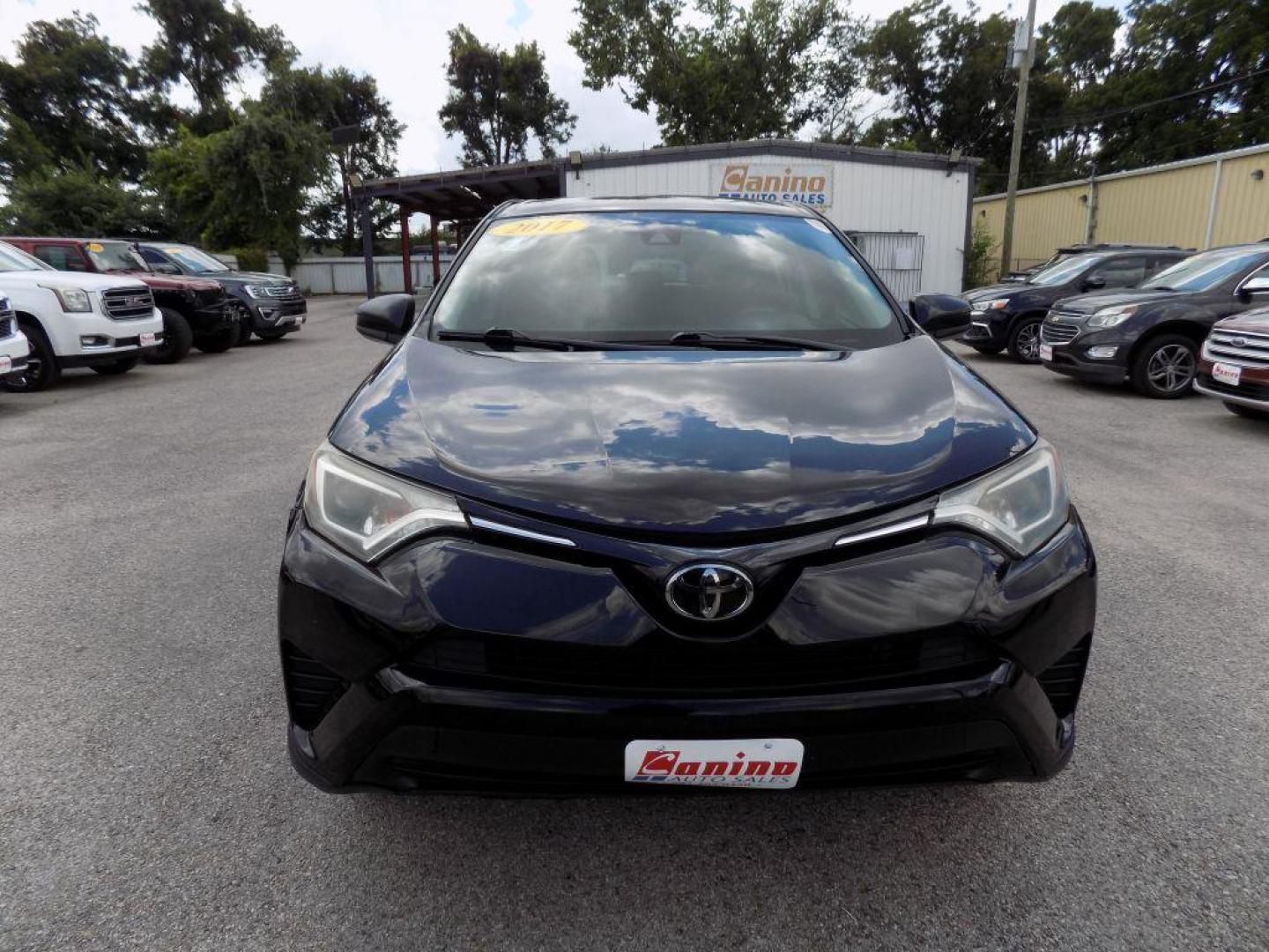 2017 BLACK TOYOTA RAV4 LE (2T3ZFREV5HW) with an 2.5L engine, Automatic transmission, located at 830 E. Canino Rd., Houston, TX, 77037, (281) 405-0440, 38.358219, -81.729942 - Photo#28