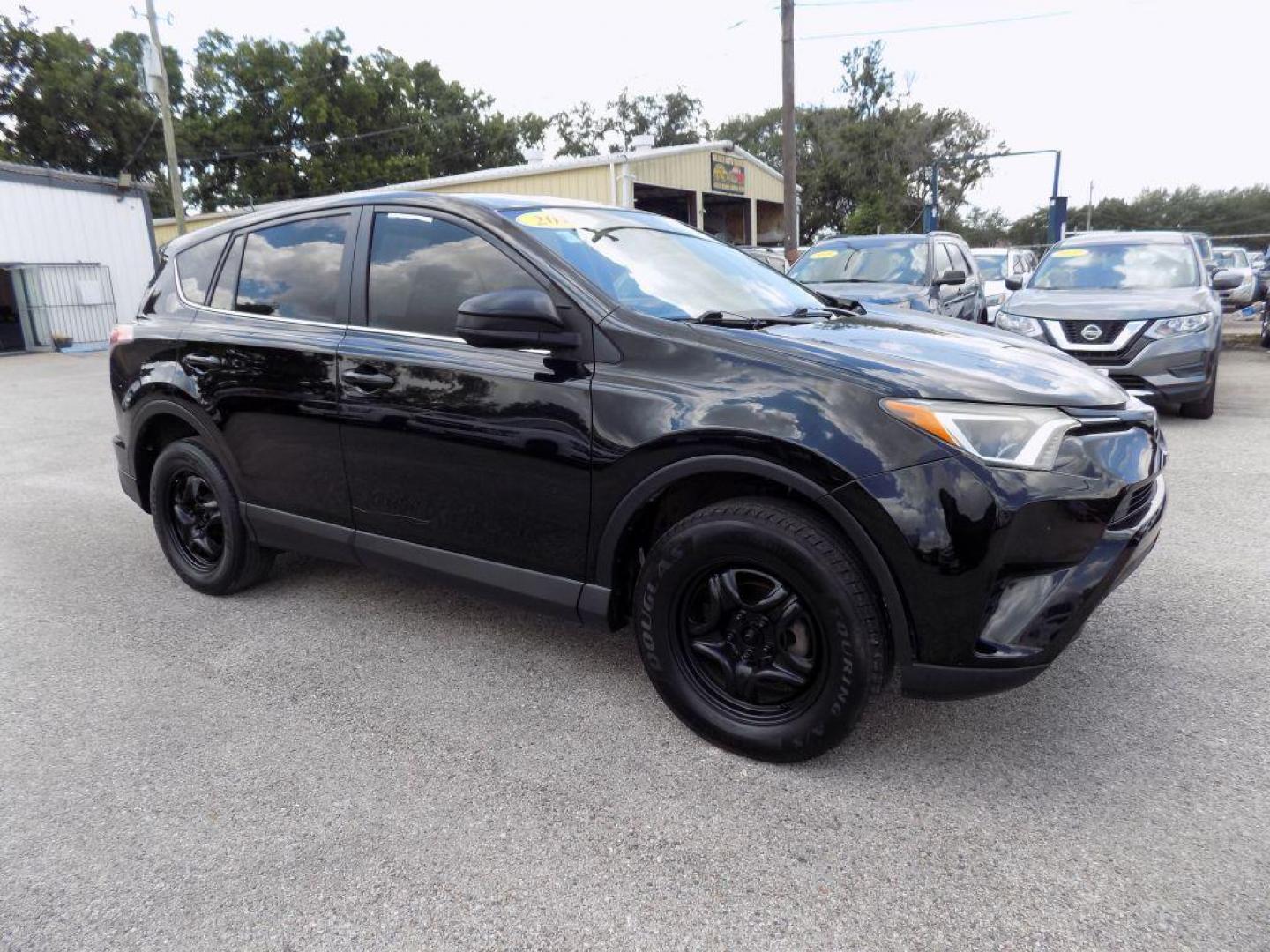 2017 BLACK TOYOTA RAV4 LE (2T3ZFREV5HW) with an 2.5L engine, Automatic transmission, located at 830 E. Canino Rd., Houston, TX, 77037, (281) 405-0440, 38.358219, -81.729942 - Photo#29