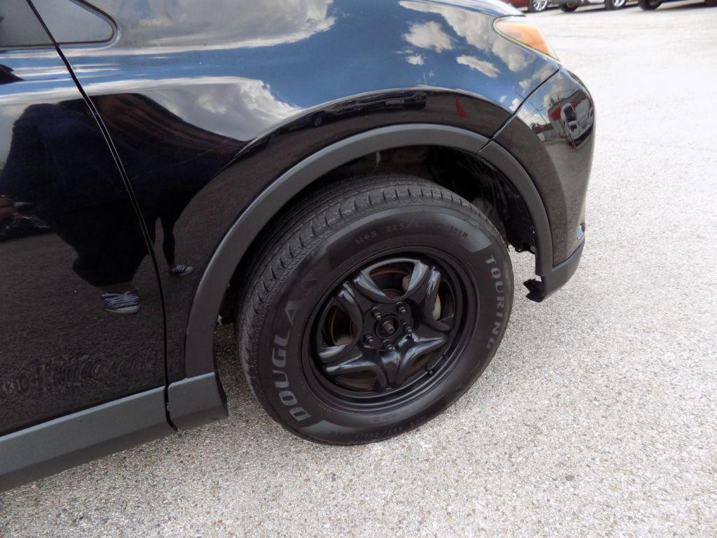 2017 BLACK TOYOTA RAV4 LE (2T3ZFREV5HW) with an 2.5L engine, Automatic transmission, located at 830 E. Canino Rd., Houston, TX, 77037, (281) 405-0440, 38.358219, -81.729942 - Photo#37