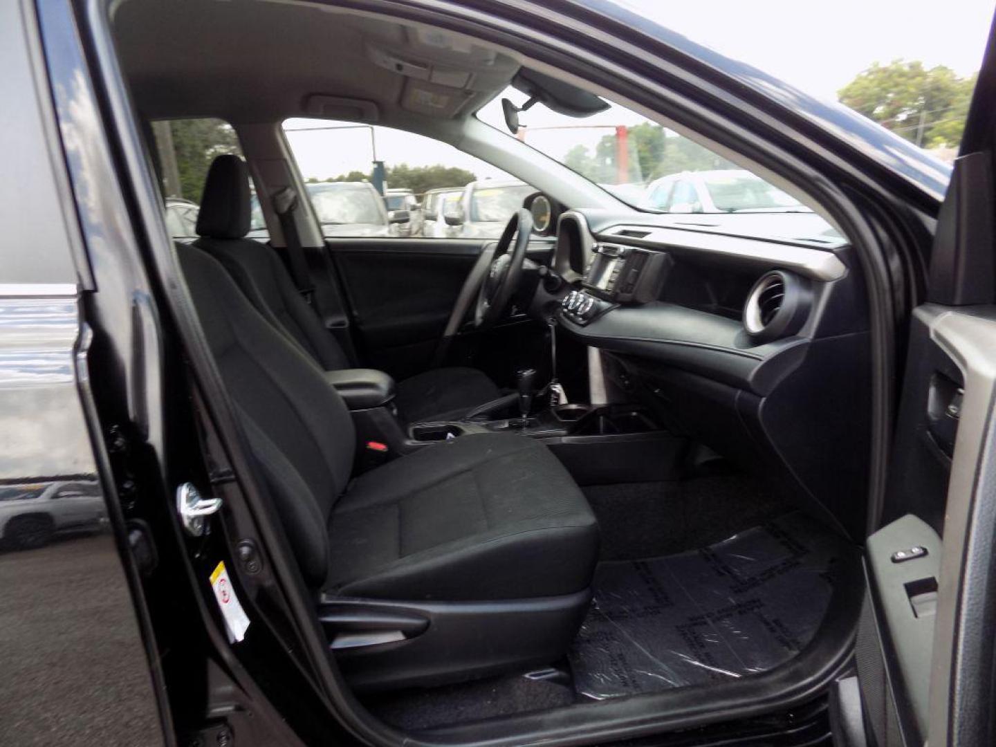 2017 BLACK TOYOTA RAV4 LE (2T3ZFREV5HW) with an 2.5L engine, Automatic transmission, located at 830 E. Canino Rd., Houston, TX, 77037, (281) 405-0440, 38.358219, -81.729942 - Photo#39