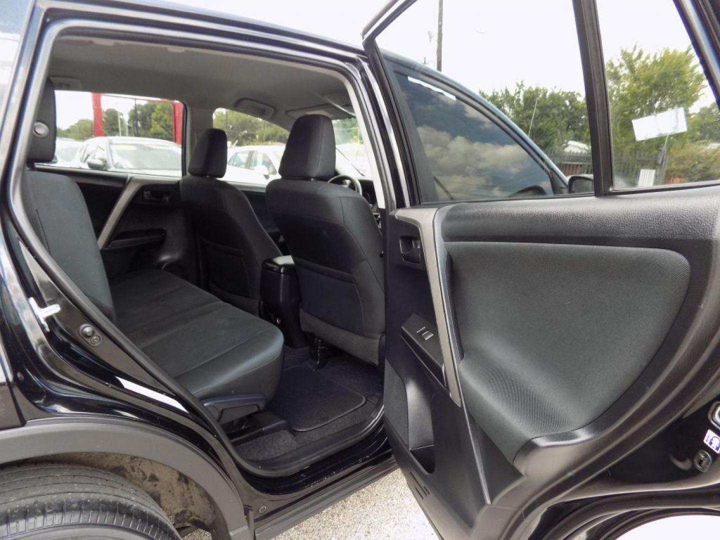 2017 BLACK TOYOTA RAV4 LE (2T3ZFREV5HW) with an 2.5L engine, Automatic transmission, located at 830 E. Canino Rd., Houston, TX, 77037, (281) 405-0440, 38.358219, -81.729942 - Photo#41