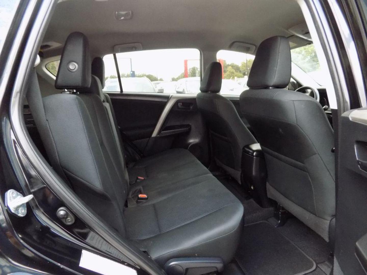 2017 BLACK TOYOTA RAV4 LE (2T3ZFREV5HW) with an 2.5L engine, Automatic transmission, located at 830 E. Canino Rd., Houston, TX, 77037, (281) 405-0440, 38.358219, -81.729942 - Photo#42
