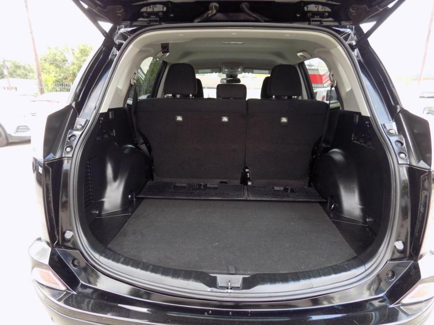 2017 BLACK TOYOTA RAV4 LE (2T3ZFREV5HW) with an 2.5L engine, Automatic transmission, located at 830 E. Canino Rd., Houston, TX, 77037, (281) 405-0440, 38.358219, -81.729942 - Photo#45