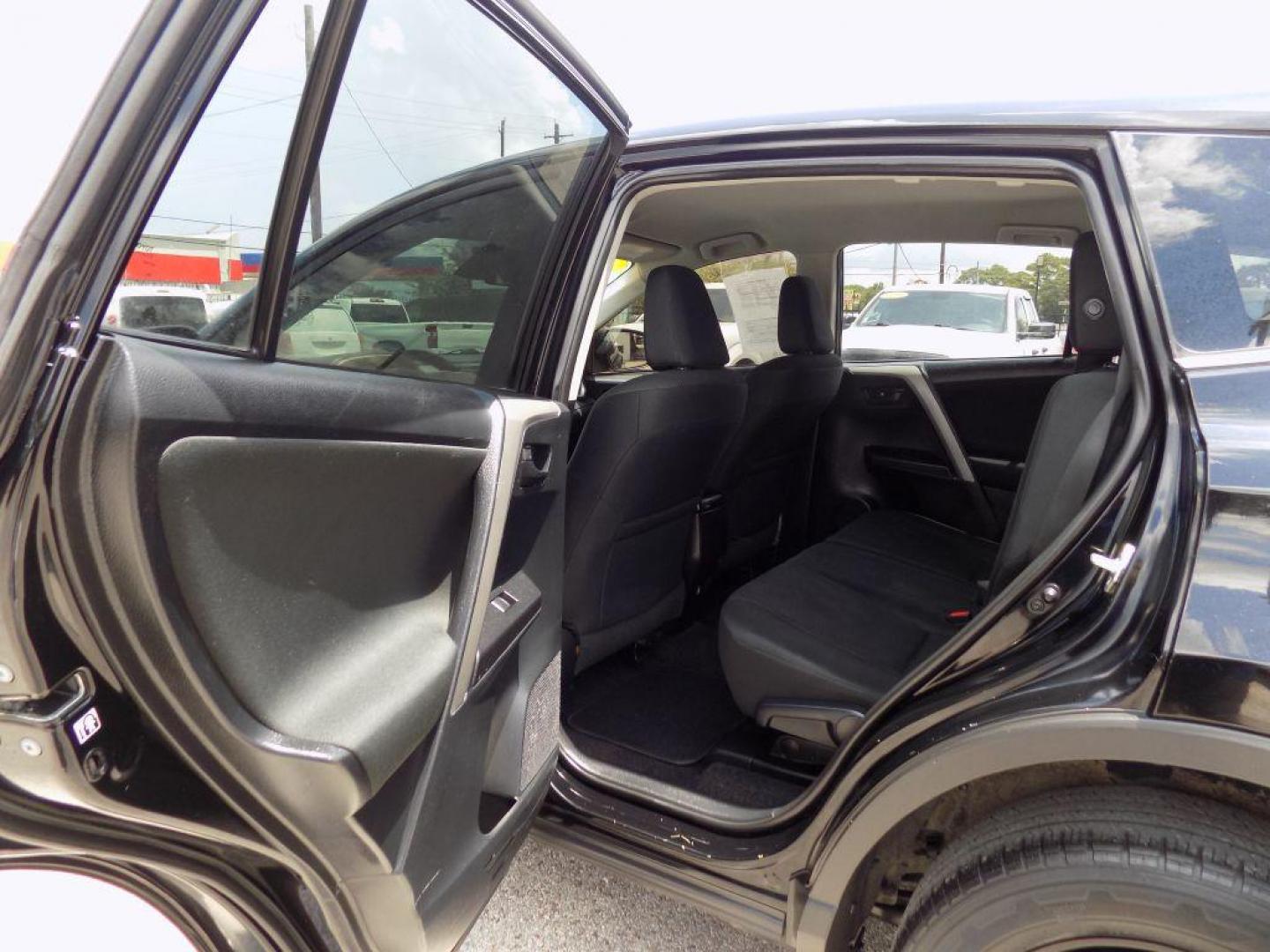 2017 BLACK TOYOTA RAV4 LE (2T3ZFREV5HW) with an 2.5L engine, Automatic transmission, located at 830 E. Canino Rd., Houston, TX, 77037, (281) 405-0440, 38.358219, -81.729942 - Photo#47