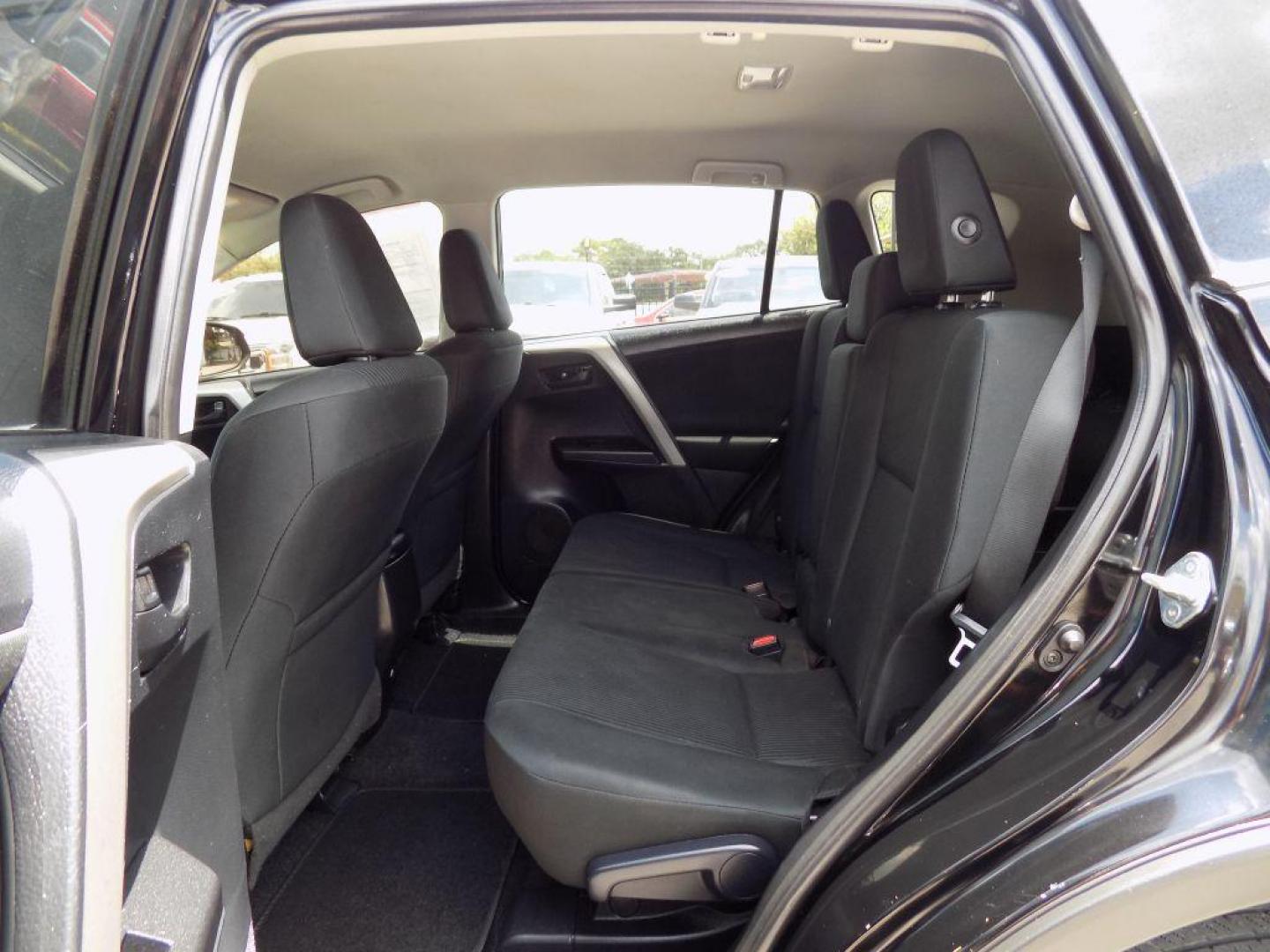 2017 BLACK TOYOTA RAV4 LE (2T3ZFREV5HW) with an 2.5L engine, Automatic transmission, located at 830 E. Canino Rd., Houston, TX, 77037, (281) 405-0440, 38.358219, -81.729942 - Photo#48