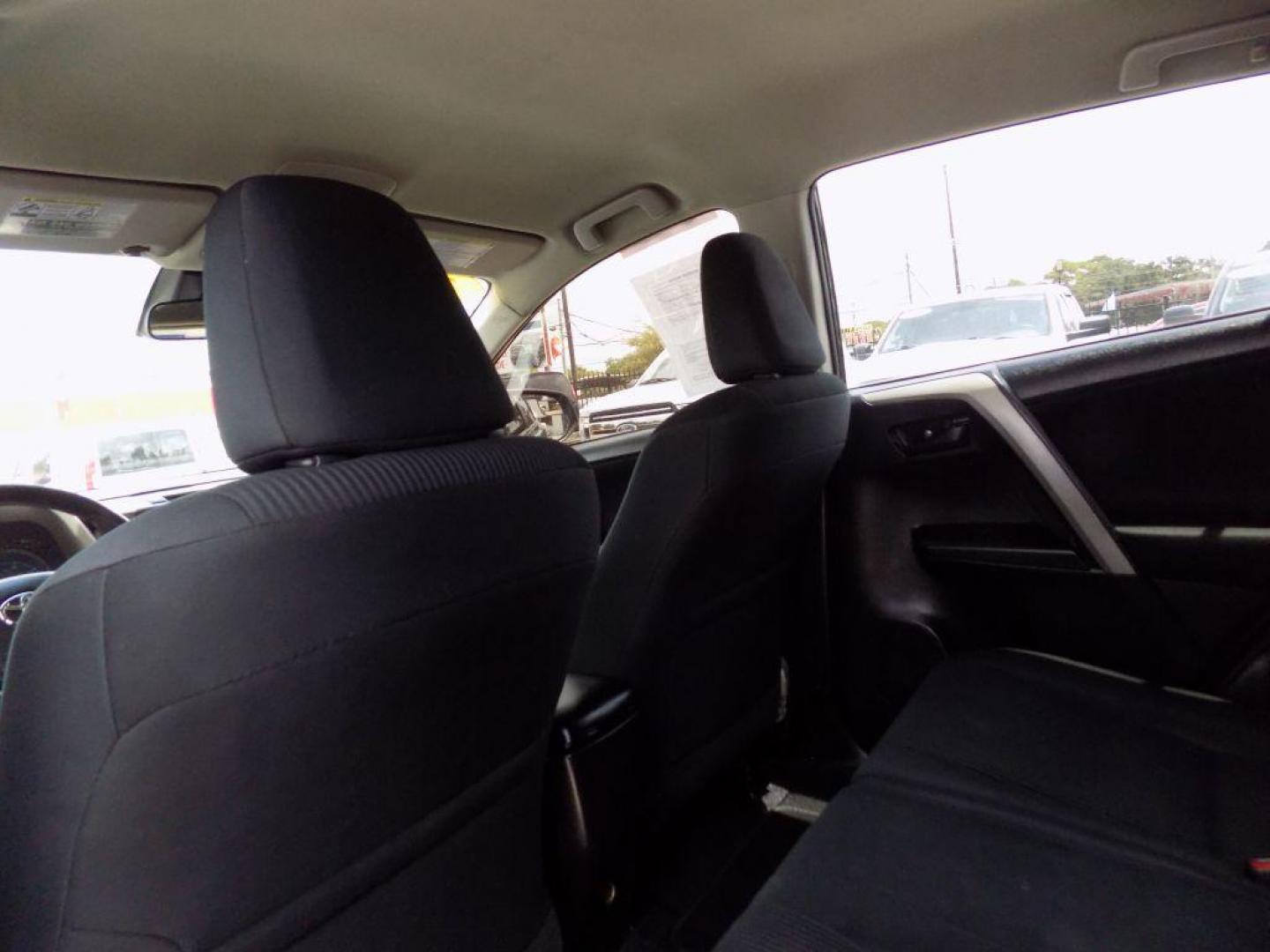 2017 BLACK TOYOTA RAV4 LE (2T3ZFREV5HW) with an 2.5L engine, Automatic transmission, located at 830 E. Canino Rd., Houston, TX, 77037, (281) 405-0440, 38.358219, -81.729942 - Photo#50