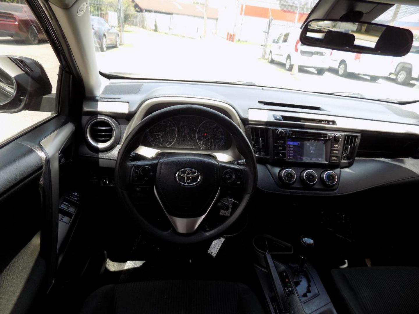 2017 BLACK TOYOTA RAV4 LE (2T3ZFREV5HW) with an 2.5L engine, Automatic transmission, located at 830 E. Canino Rd., Houston, TX, 77037, (281) 405-0440, 38.358219, -81.729942 - Photo#52
