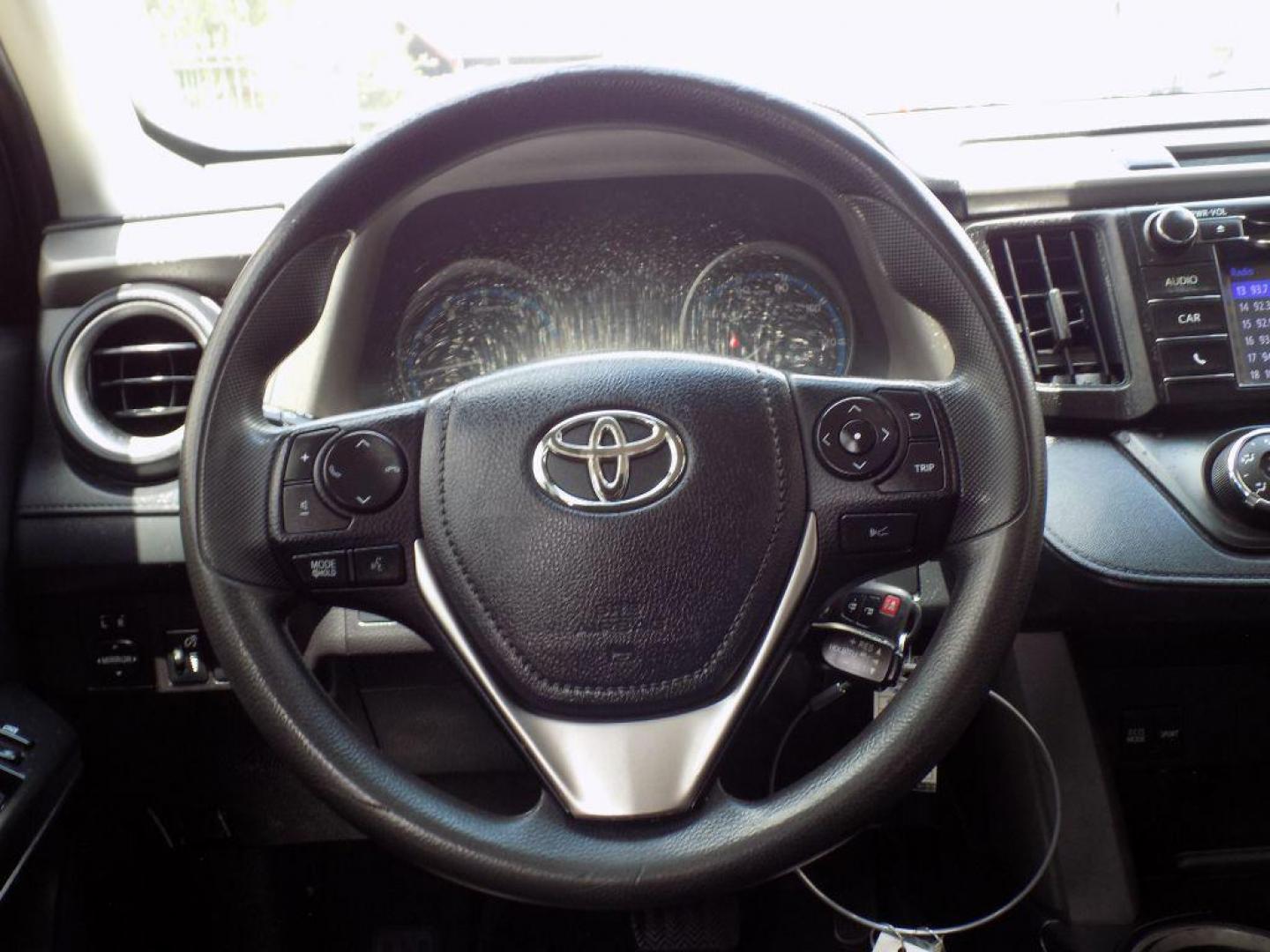 2017 BLACK TOYOTA RAV4 LE (2T3ZFREV5HW) with an 2.5L engine, Automatic transmission, located at 830 E. Canino Rd., Houston, TX, 77037, (281) 405-0440, 38.358219, -81.729942 - Photo#53