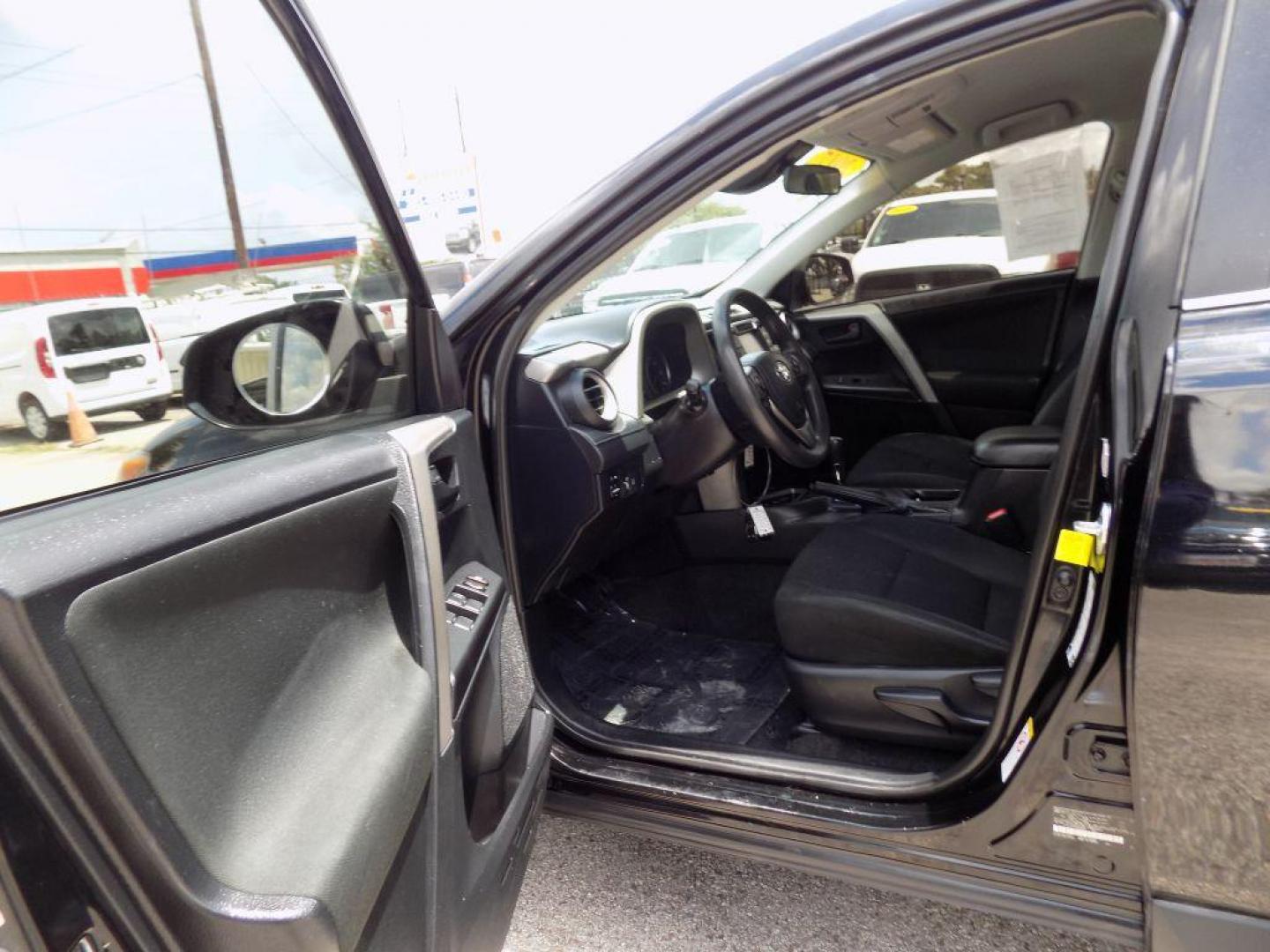 2017 BLACK TOYOTA RAV4 LE (2T3ZFREV5HW) with an 2.5L engine, Automatic transmission, located at 830 E. Canino Rd., Houston, TX, 77037, (281) 405-0440, 38.358219, -81.729942 - Photo#54
