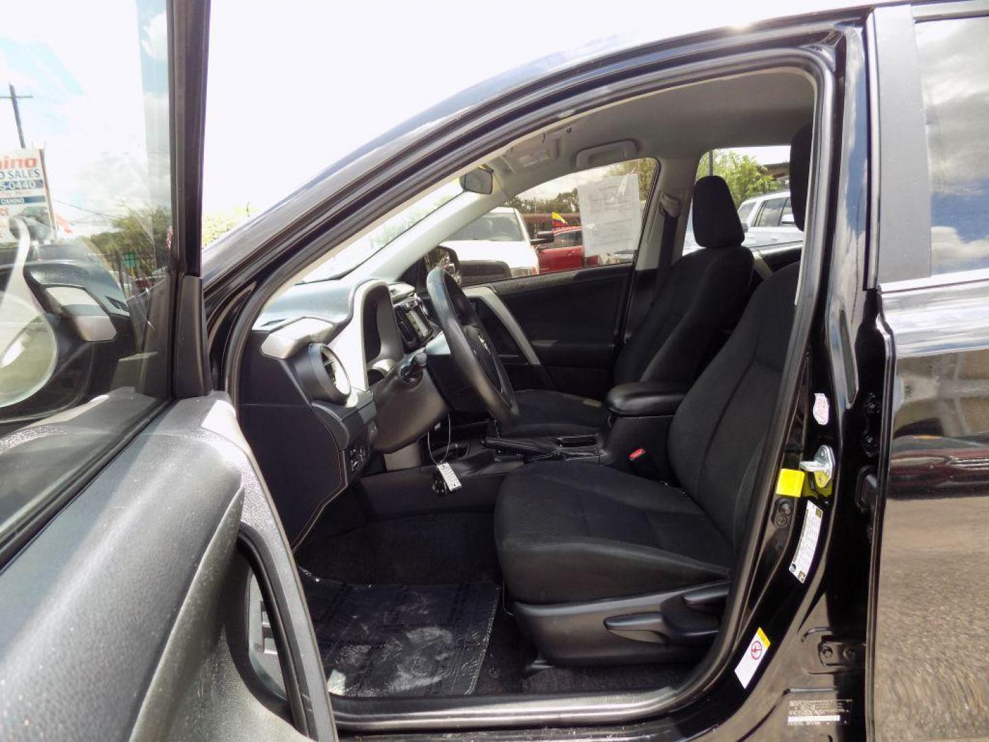2017 BLACK TOYOTA RAV4 LE (2T3ZFREV5HW) with an 2.5L engine, Automatic transmission, located at 830 E. Canino Rd., Houston, TX, 77037, (281) 405-0440, 38.358219, -81.729942 - Photo#55
