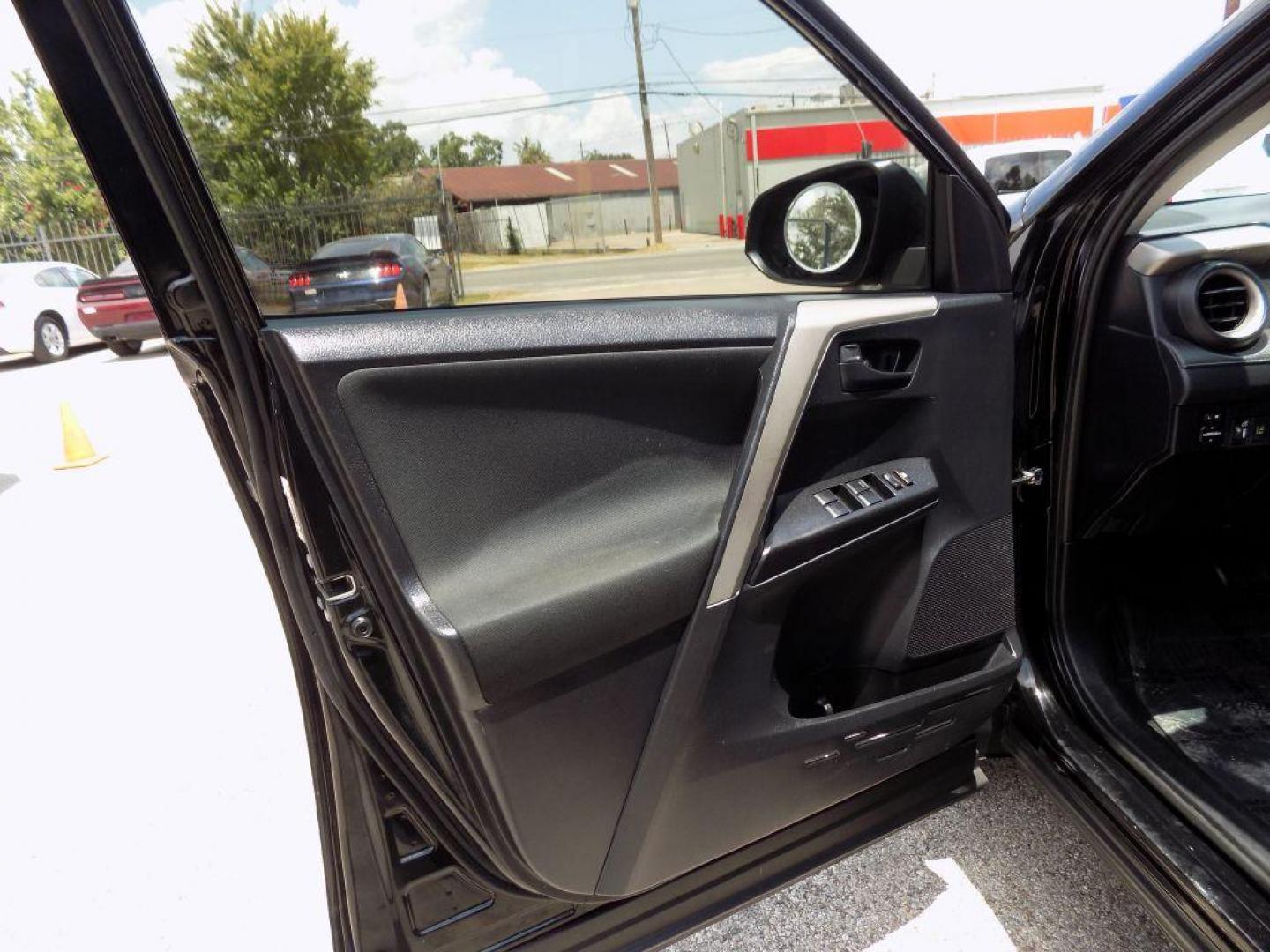 2017 BLACK TOYOTA RAV4 LE (2T3ZFREV5HW) with an 2.5L engine, Automatic transmission, located at 830 E. Canino Rd., Houston, TX, 77037, (281) 405-0440, 38.358219, -81.729942 - Photo#56