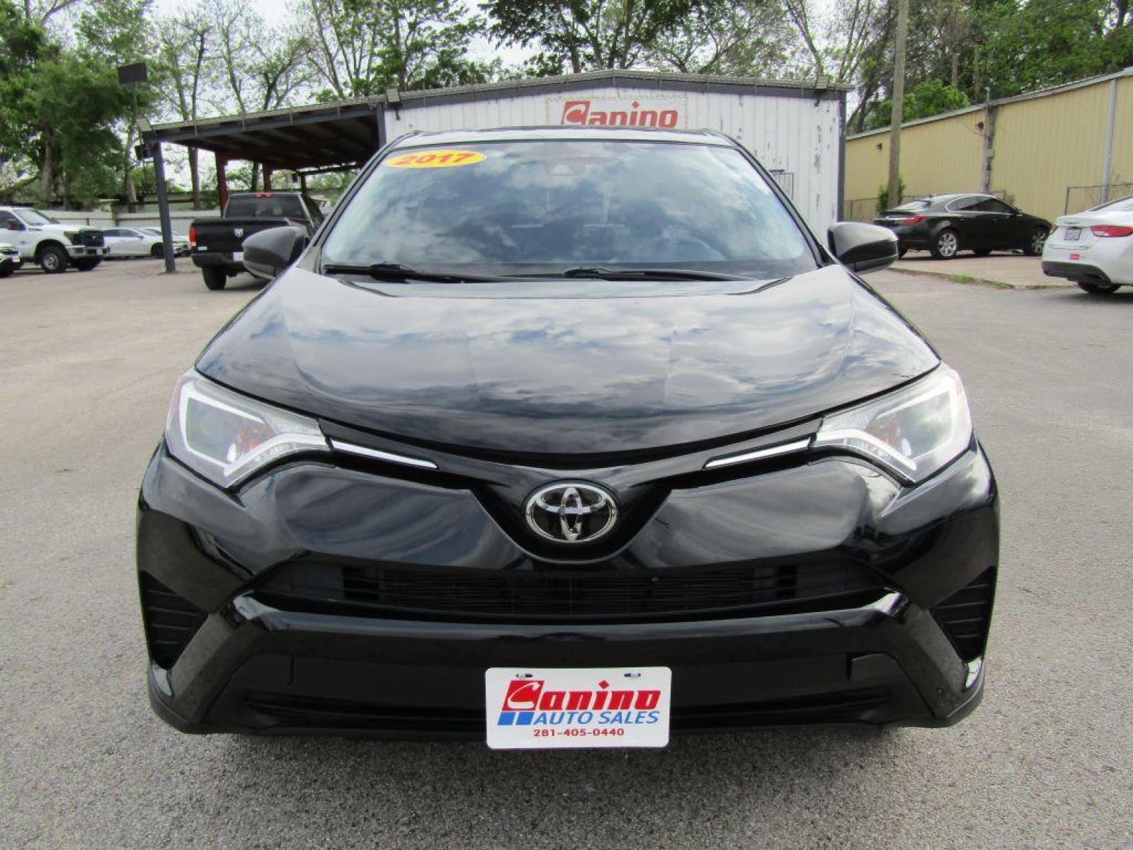 2017 BLACK TOYOTA RAV4 LE (2T3ZFREV5HW) with an 2.5L engine, Automatic transmission, located at 830 E. Canino Rd., Houston, TX, 77037, (281) 405-0440, 38.358219, -81.729942 - Photo #0