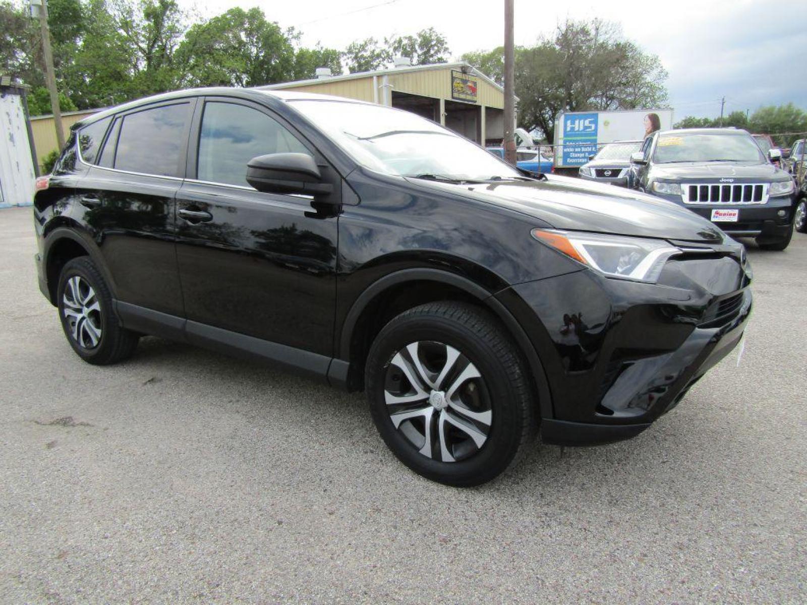 2017 BLACK TOYOTA RAV4 LE (2T3ZFREV5HW) with an 2.5L engine, Automatic transmission, located at 830 E. Canino Rd., Houston, TX, 77037, (281) 405-0440, 38.358219, -81.729942 - Photo #1