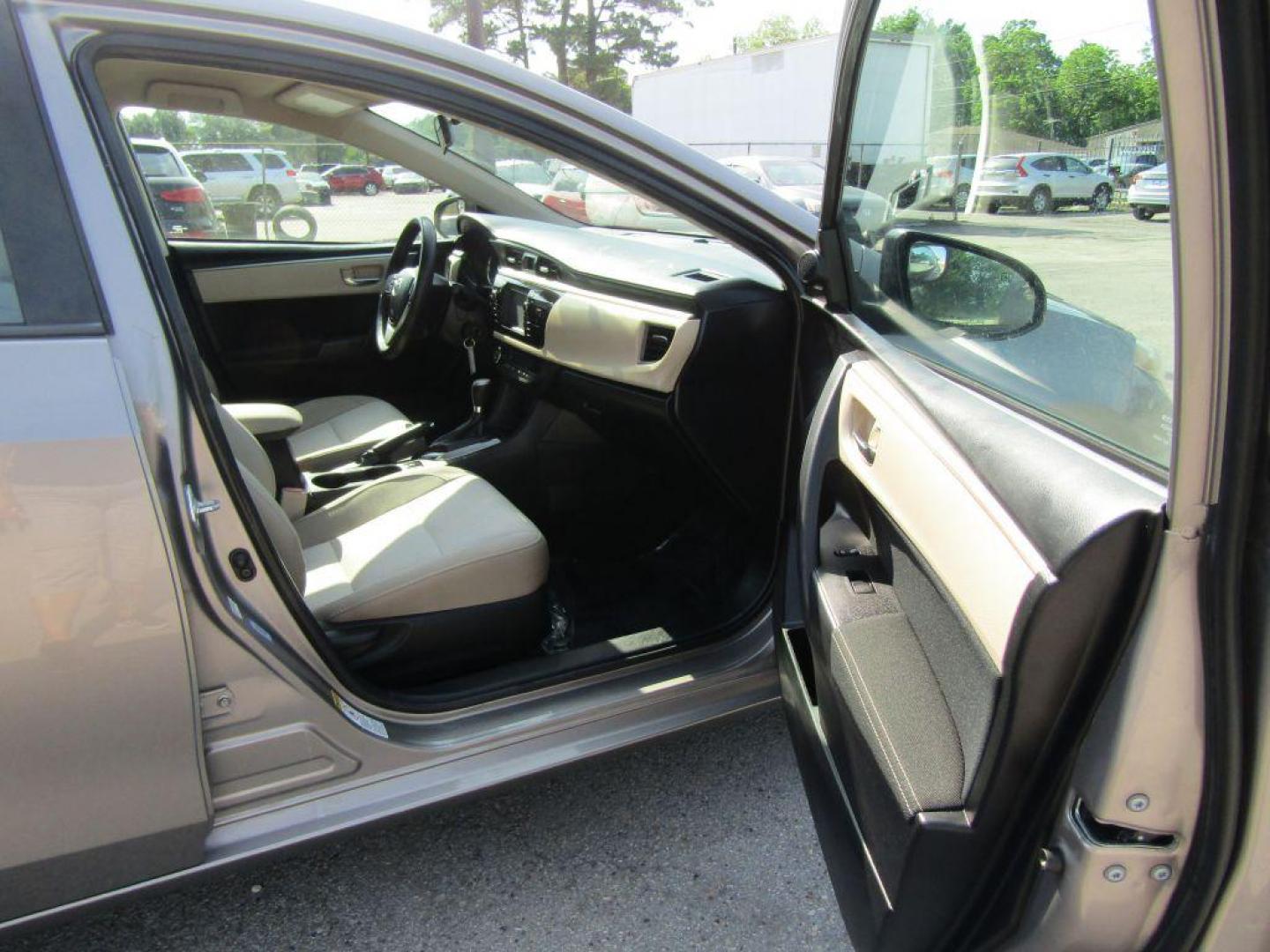 2016 BROWN TOYOTA COROLLA L (2T1BURHE9GC) with an 1.8L engine, Automatic transmission, located at 830 E. Canino Rd., Houston, TX, 77037, (281) 405-0440, 38.358219, -81.729942 - Photo#10
