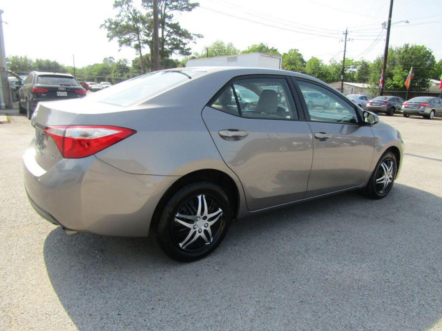 2016 BROWN TOYOTA COROLLA L (2T1BURHE9GC) with an 1.8L engine, Automatic transmission, located at 830 E. Canino Rd., Houston, TX, 77037, (281) 405-0440, 38.358219, -81.729942 - Photo#2