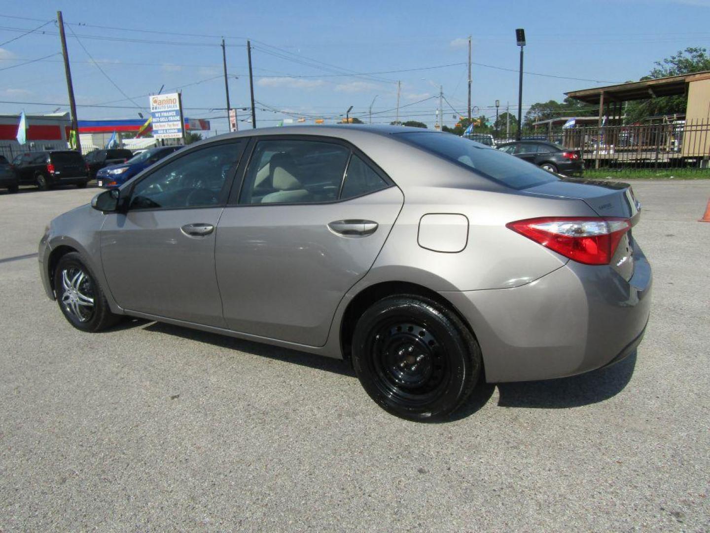 2016 BROWN TOYOTA COROLLA L (2T1BURHE9GC) with an 1.8L engine, Automatic transmission, located at 830 E. Canino Rd., Houston, TX, 77037, (281) 405-0440, 38.358219, -81.729942 - Photo#4
