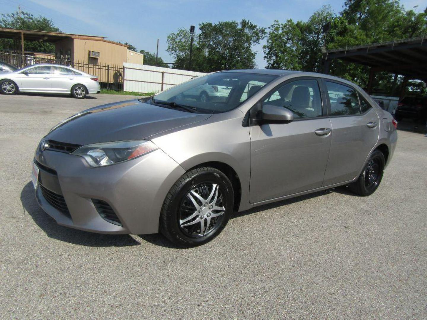 2016 BROWN TOYOTA COROLLA L (2T1BURHE9GC) with an 1.8L engine, Automatic transmission, located at 830 E. Canino Rd., Houston, TX, 77037, (281) 405-0440, 38.358219, -81.729942 - Photo#5