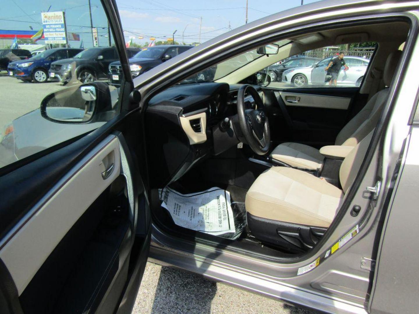 2016 BROWN TOYOTA COROLLA L (2T1BURHE9GC) with an 1.8L engine, Automatic transmission, located at 830 E. Canino Rd., Houston, TX, 77037, (281) 405-0440, 38.358219, -81.729942 - Photo#6