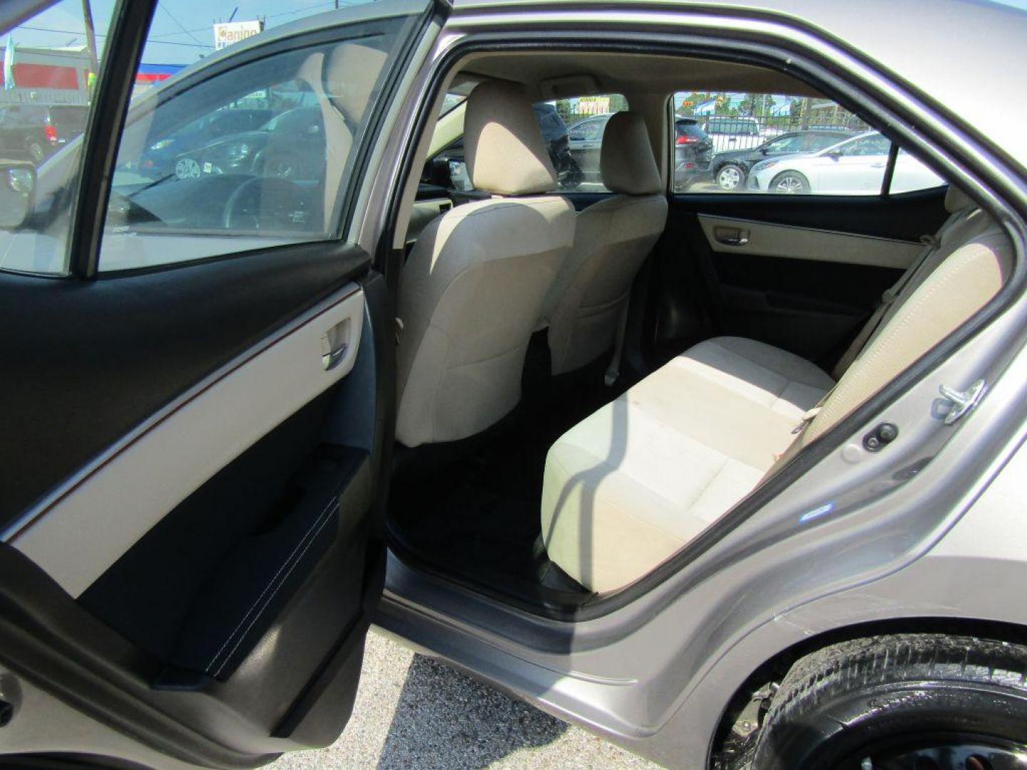 2016 BROWN TOYOTA COROLLA L (2T1BURHE9GC) with an 1.8L engine, Automatic transmission, located at 830 E. Canino Rd., Houston, TX, 77037, (281) 405-0440, 38.358219, -81.729942 - Photo#7