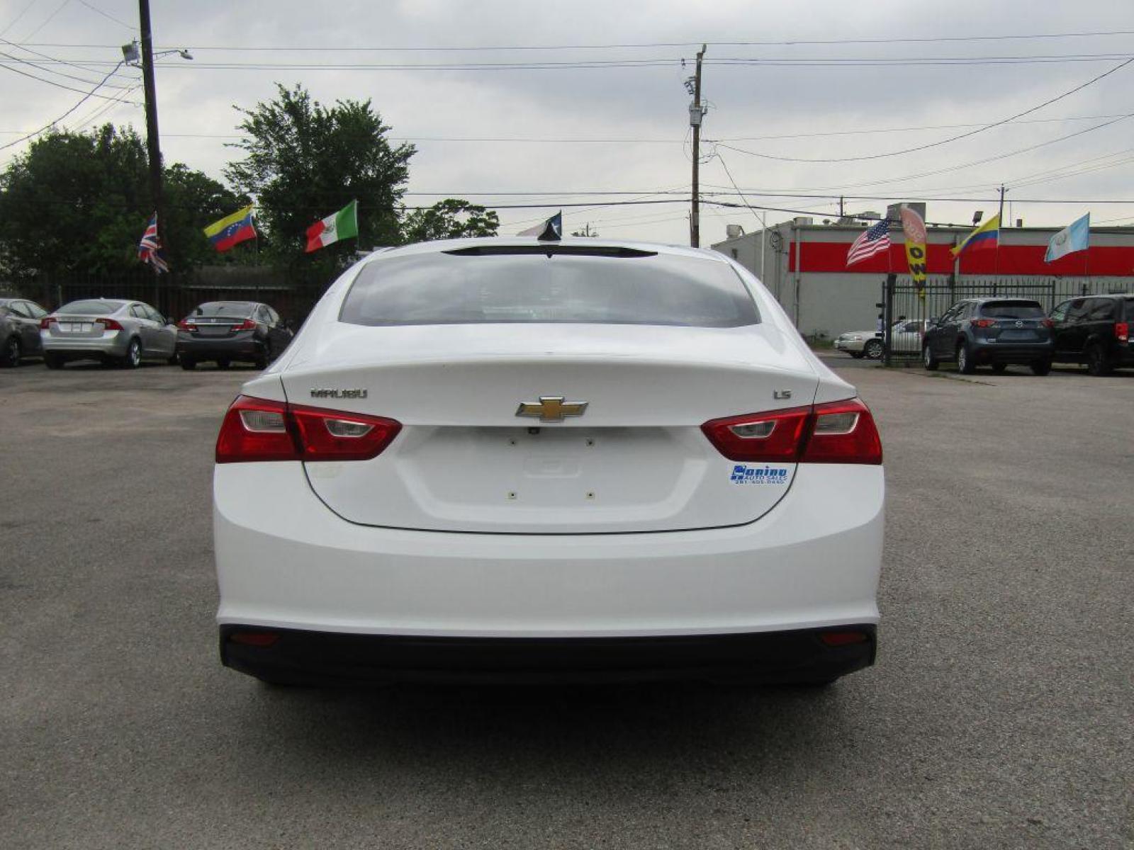 2016 WHITE CHEVROLET MALIBU LS (1G1ZB5ST4GF) with an 1.5L engine, Automatic transmission, located at 830 E. Canino Rd., Houston, TX, 77037, (281) 405-0440, 38.358219, -81.729942 - Photo #3