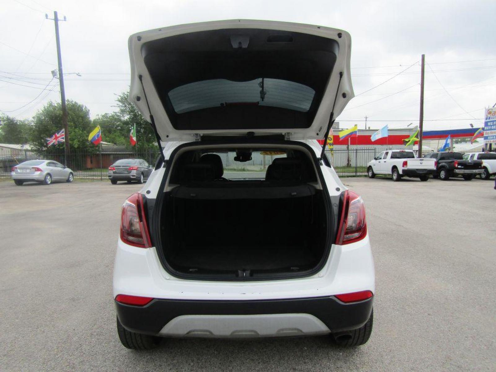 2017 WHITE BUICK ENCORE PREFERRED (KL4CJASB4HB) with an 1.4L engine, Automatic transmission, located at 830 E. Canino Rd., Houston, TX, 77037, (281) 405-0440, 38.358219, -81.729942 - Photo #16