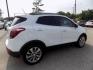 2017 WHITE BUICK ENCORE PREFERRED (KL4CJASB4HB) with an 1.4L engine, Automatic transmission, located at 830 E. Canino Rd., Houston, TX, 77037, (281) 405-0440, 38.358219, -81.729942 - Photo#5