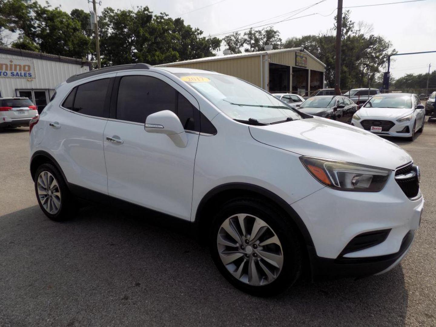 2017 WHITE BUICK ENCORE PREFERRED (KL4CJASB4HB) with an 1.4L engine, Automatic transmission, located at 830 E. Canino Rd., Houston, TX, 77037, (281) 405-0440, 38.358219, -81.729942 - Photo#7