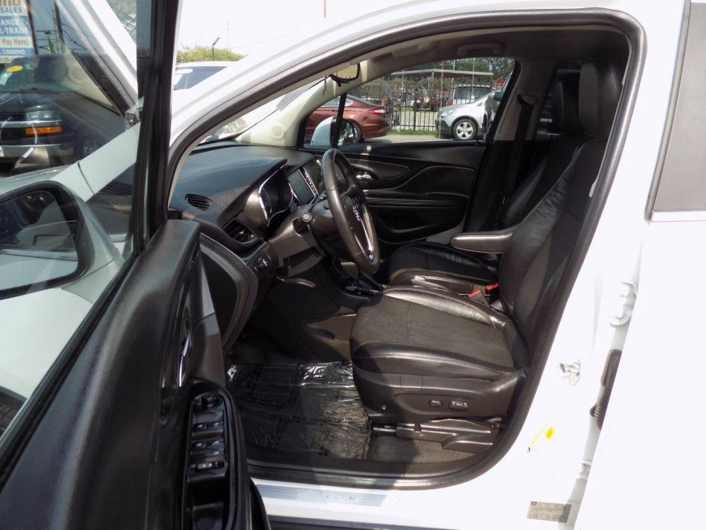 2017 WHITE BUICK ENCORE PREFERRED (KL4CJASB4HB) with an 1.4L engine, Automatic transmission, located at 830 E. Canino Rd., Houston, TX, 77037, (281) 405-0440, 38.358219, -81.729942 - Photo#8