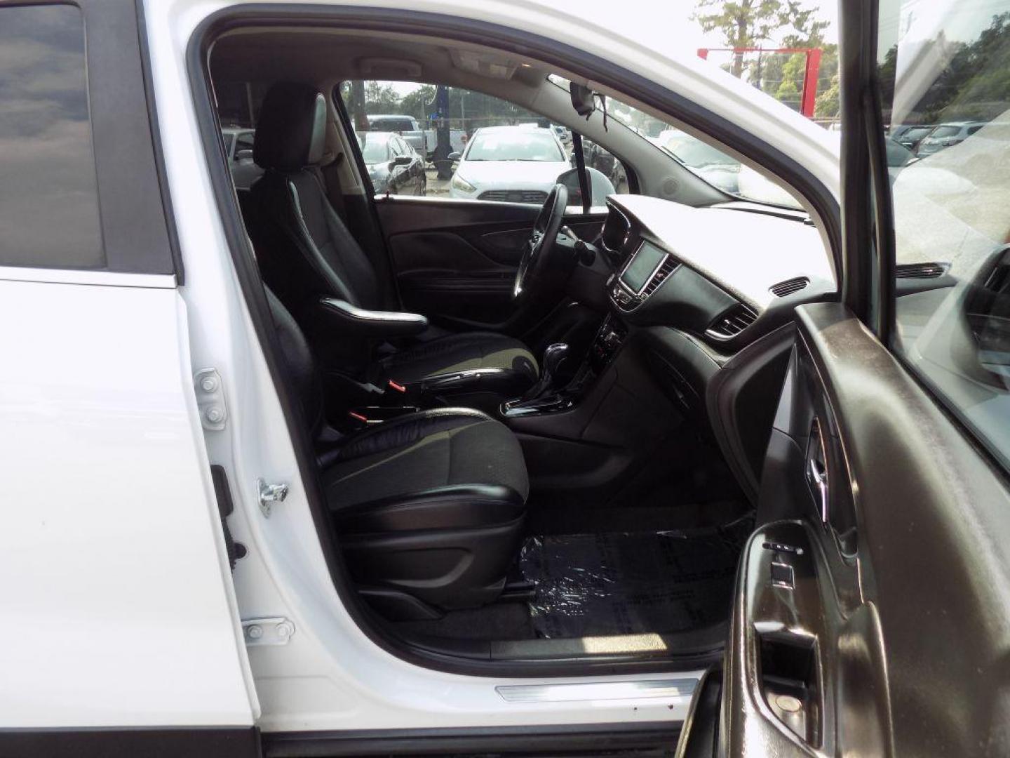 2017 WHITE BUICK ENCORE PREFERRED (KL4CJASB4HB) with an 1.4L engine, Automatic transmission, located at 830 E. Canino Rd., Houston, TX, 77037, (281) 405-0440, 38.358219, -81.729942 - Photo#11