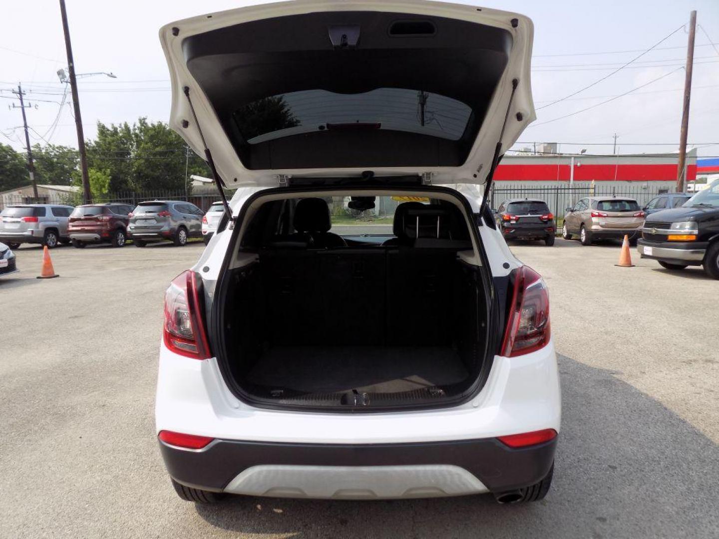 2017 WHITE BUICK ENCORE PREFERRED (KL4CJASB4HB) with an 1.4L engine, Automatic transmission, located at 830 E. Canino Rd., Houston, TX, 77037, (281) 405-0440, 38.358219, -81.729942 - Photo#12
