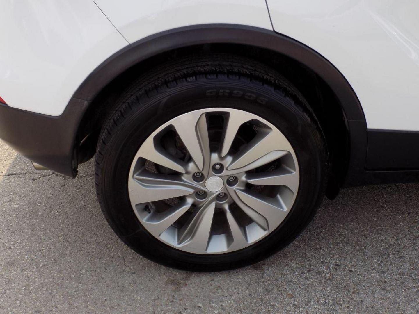 2017 WHITE BUICK ENCORE PREFERRED (KL4CJASB4HB) with an 1.4L engine, Automatic transmission, located at 830 E. Canino Rd., Houston, TX, 77037, (281) 405-0440, 38.358219, -81.729942 - Photo#17