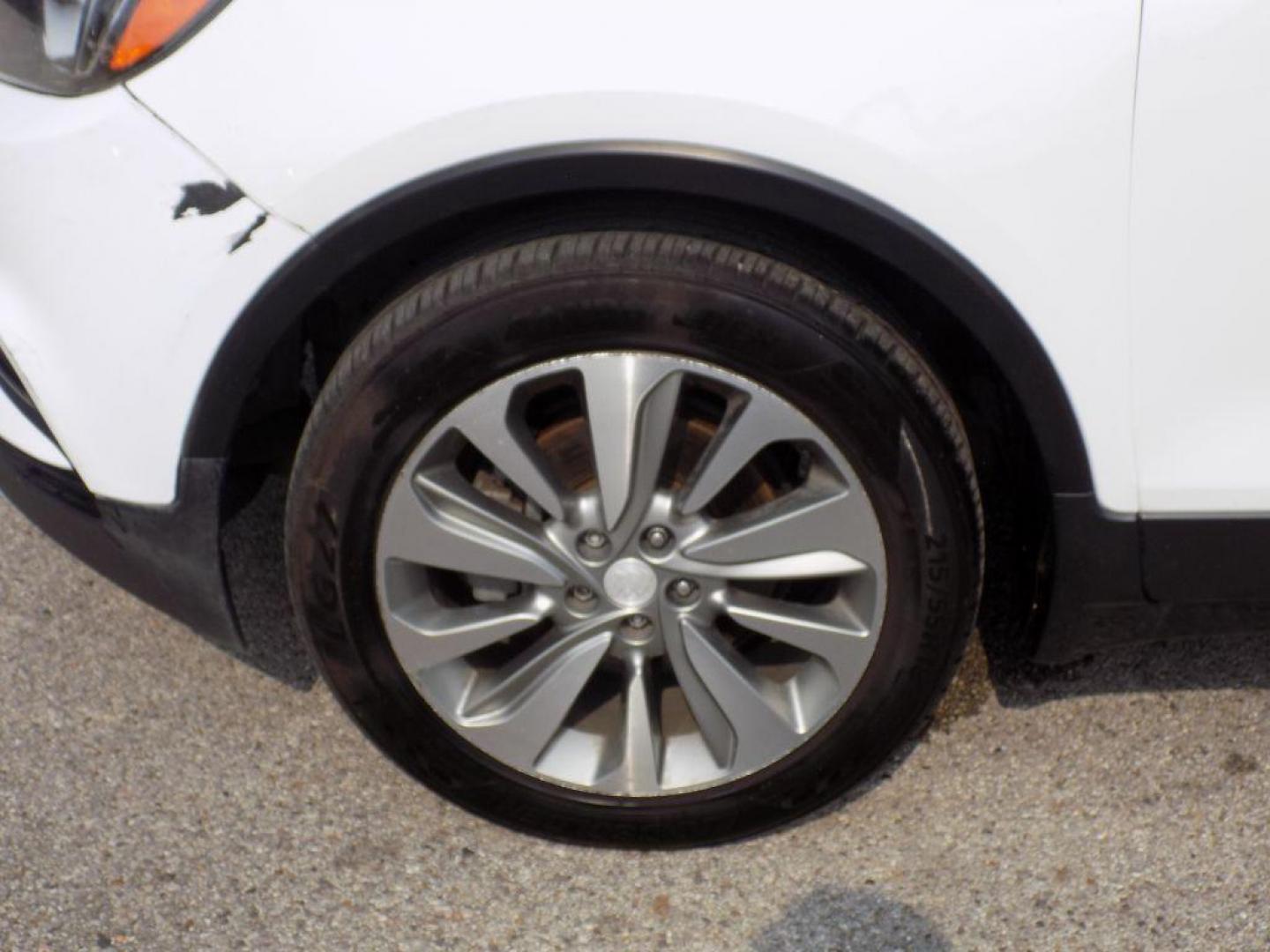 2017 WHITE BUICK ENCORE PREFERRED (KL4CJASB4HB) with an 1.4L engine, Automatic transmission, located at 830 E. Canino Rd., Houston, TX, 77037, (281) 405-0440, 38.358219, -81.729942 - Photo#19