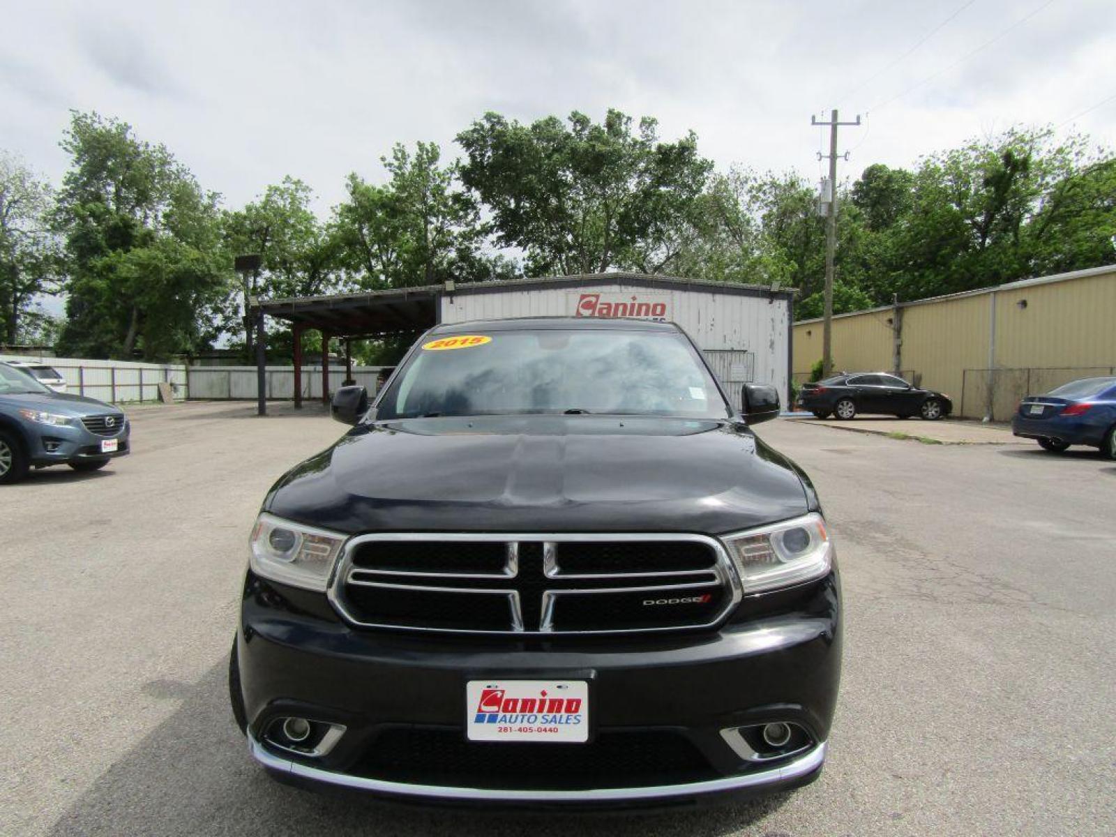 2015 BLACK DODGE DURANGO SXT (1C4RDHAG2FC) with an 3.6L engine, Automatic transmission, located at 830 E. Canino Rd., Houston, TX, 77037, (281) 405-0440, 38.358219, -81.729942 - Photo #0
