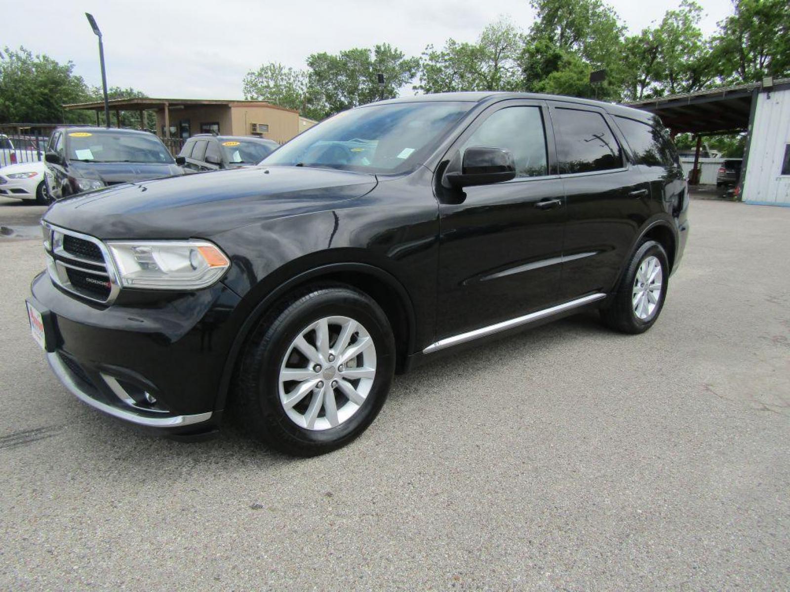 2015 BLACK DODGE DURANGO SXT (1C4RDHAG2FC) with an 3.6L engine, Automatic transmission, located at 830 E. Canino Rd., Houston, TX, 77037, (281) 405-0440, 38.358219, -81.729942 - Photo #1