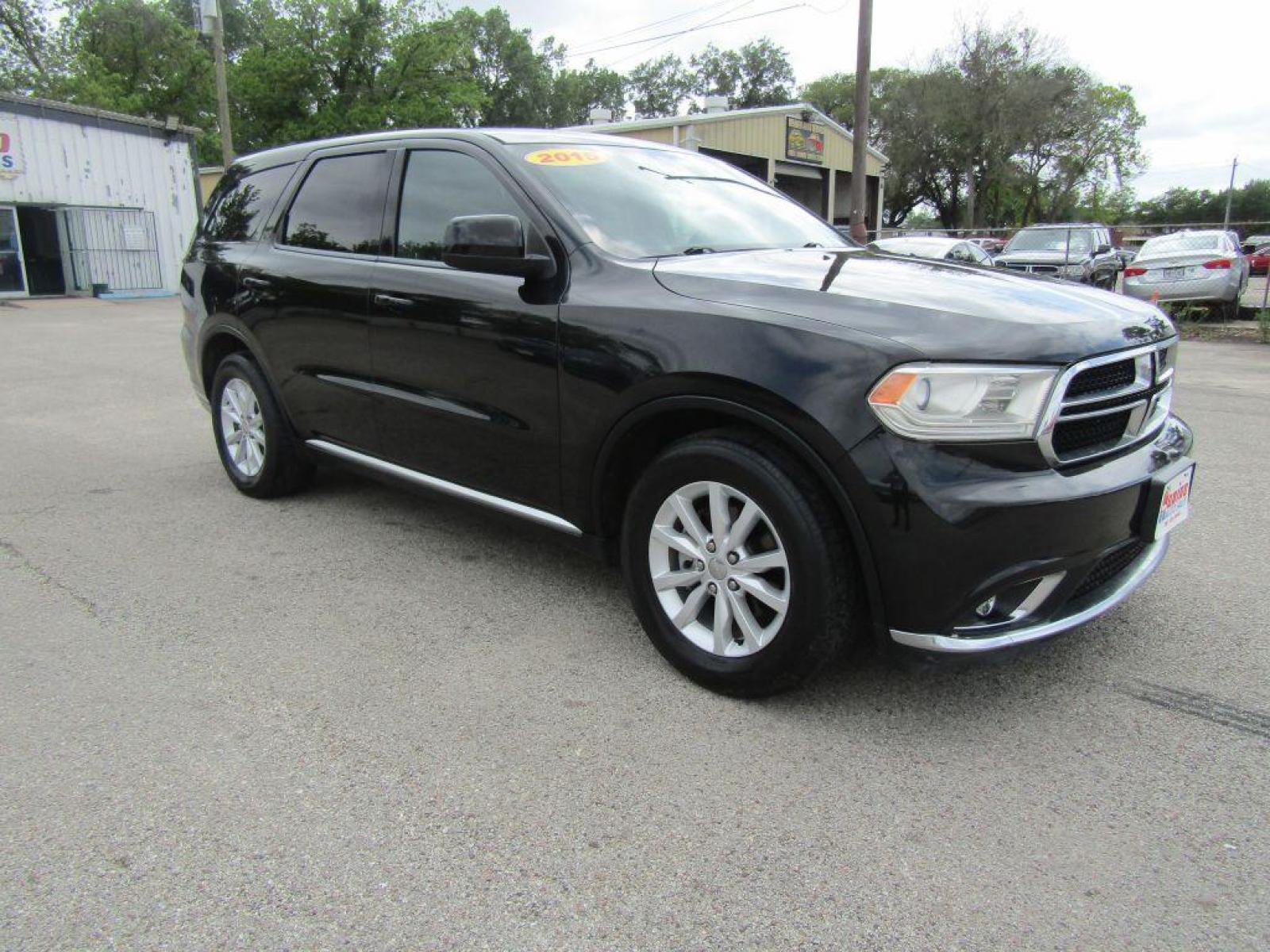2015 BLACK DODGE DURANGO SXT (1C4RDHAG2FC) with an 3.6L engine, Automatic transmission, located at 830 E. Canino Rd., Houston, TX, 77037, (281) 405-0440, 38.358219, -81.729942 - Photo #5