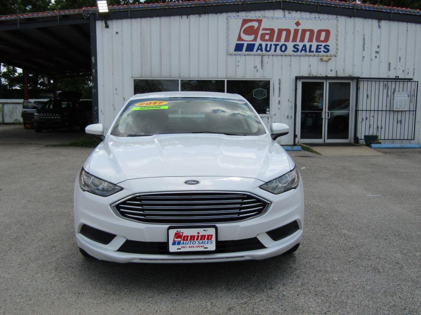 2017 WHITE FORD FUSION SE (3FA6P0H73HR) with an 2.5L engine, Automatic transmission, located at 830 E. Canino Rd., Houston, TX, 77037, (281) 405-0440, 38.358219, -81.729942 - Photo#0