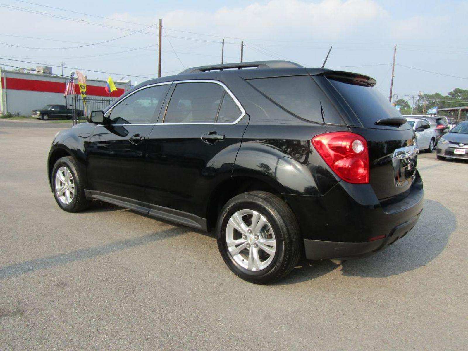2014 BLACK CHEVROLET EQUINOX LT (2GNALBEK6E1) with an 2.4L engine, Automatic transmission, located at 830 E. Canino Rd., Houston, TX, 77037, (281) 405-0440, 38.358219, -81.729942 - Photo #2
