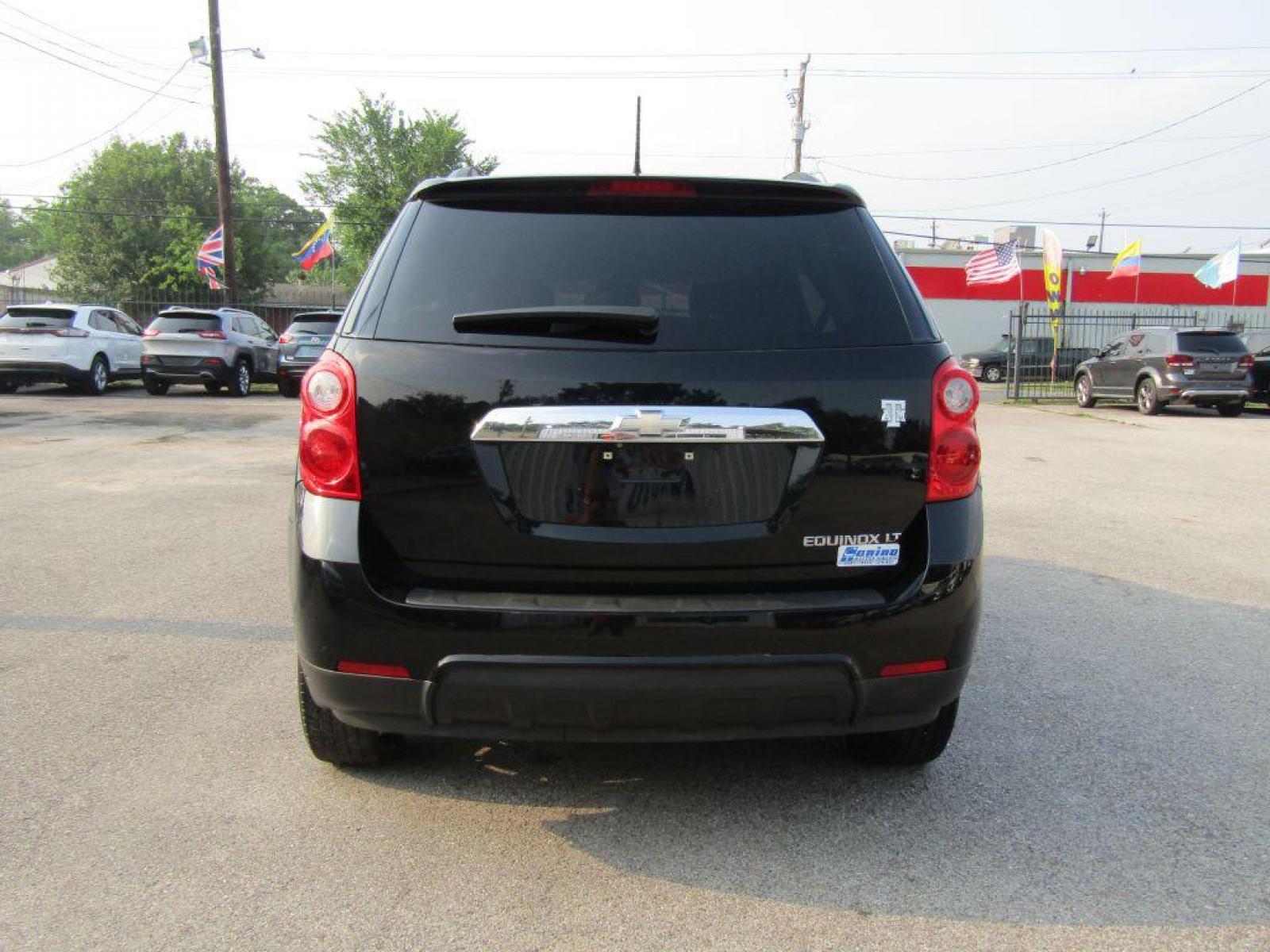 2014 BLACK CHEVROLET EQUINOX LT (2GNALBEK6E1) with an 2.4L engine, Automatic transmission, located at 830 E. Canino Rd., Houston, TX, 77037, (281) 405-0440, 38.358219, -81.729942 - Photo #3
