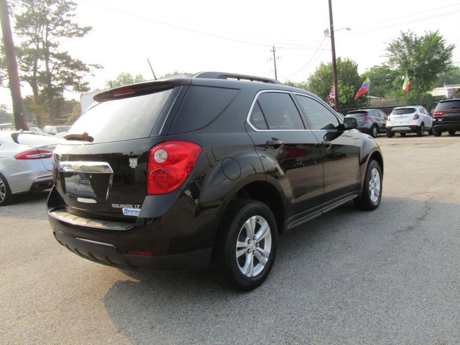 2014 BLACK CHEVROLET EQUINOX LT (2GNALBEK6E1) with an 2.4L engine, Automatic transmission, located at 830 E. Canino Rd., Houston, TX, 77037, (281) 405-0440, 38.358219, -81.729942 - Photo #4