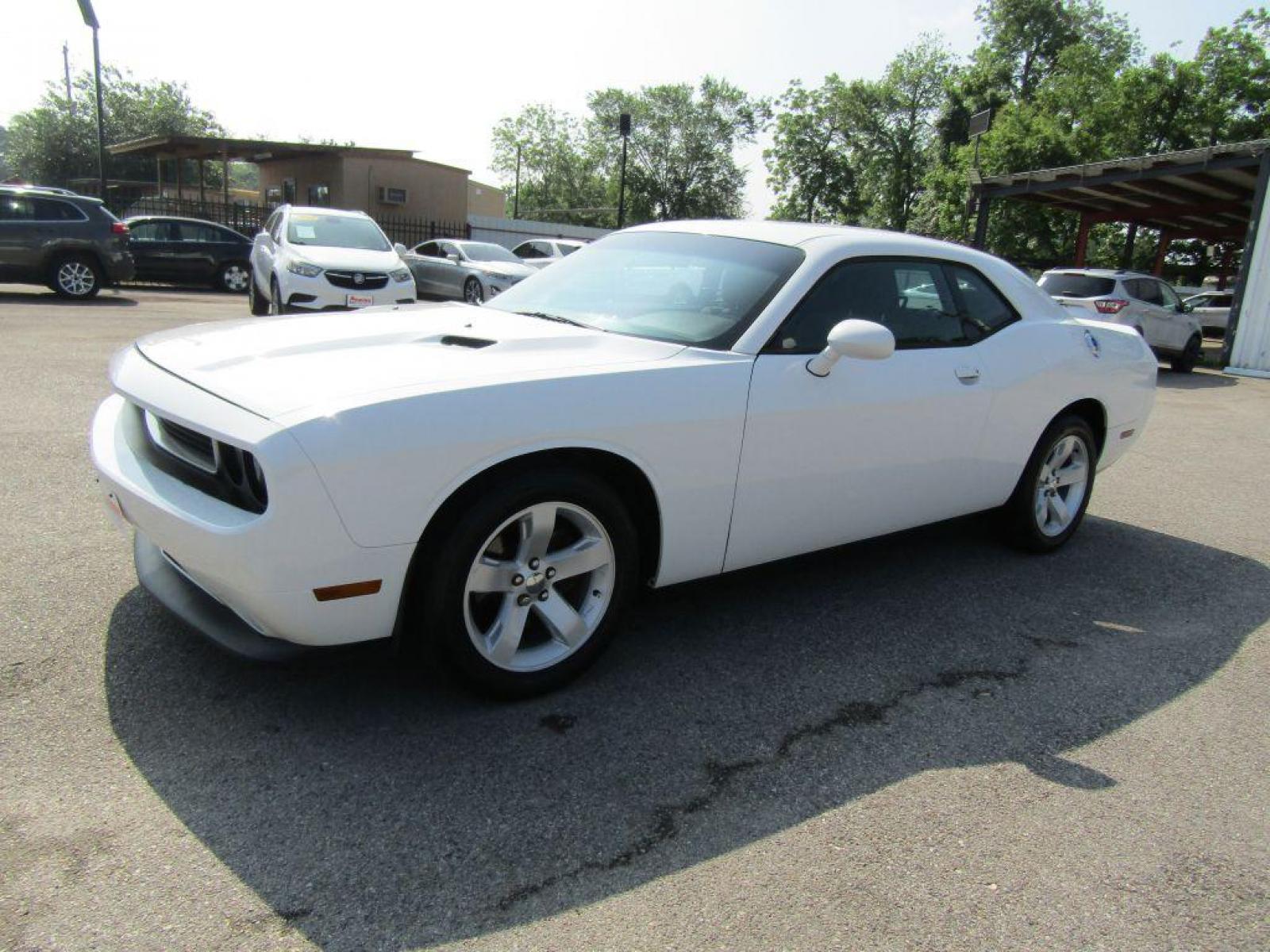 2014 WHITE DODGE CHALLENGER SXT (2C3CDYAG1EH) with an 3.6L engine, Automatic transmission, located at 830 E. Canino Rd., Houston, TX, 77037, (281) 405-0440, 38.358219, -81.729942 - Photo #5